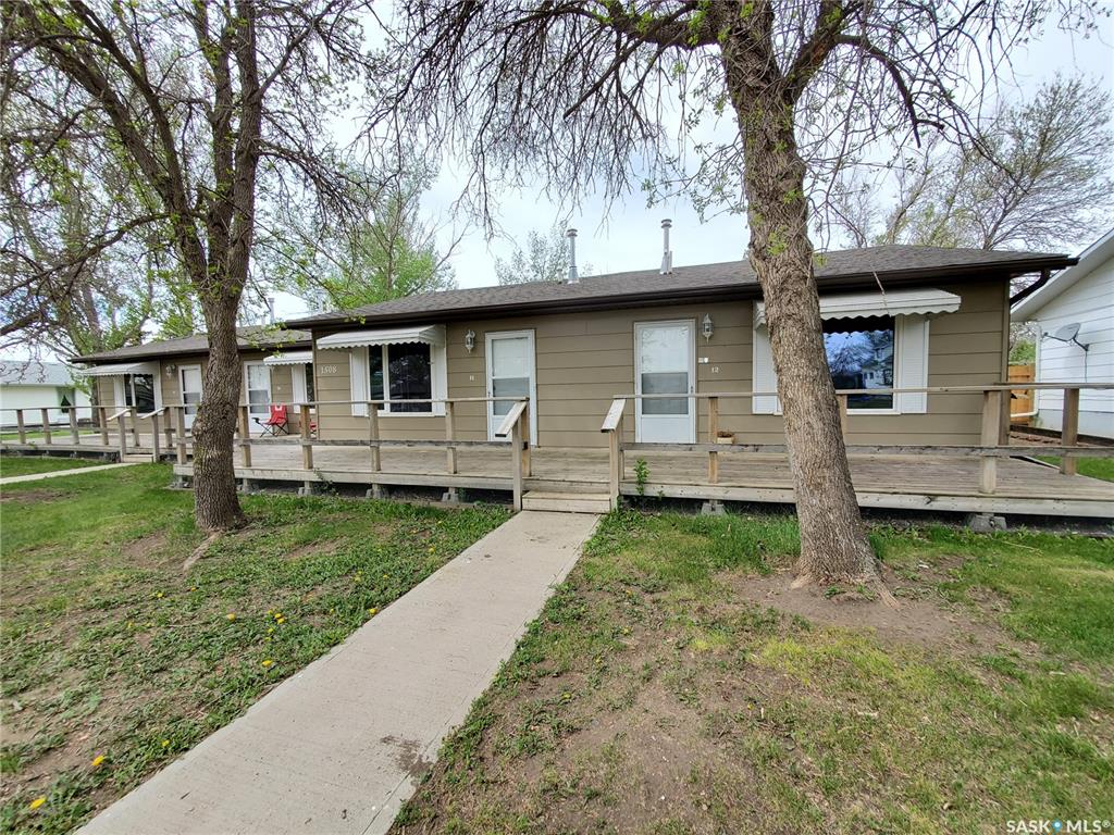 At just $20,000 per door, how can you resist this affordable 4-plex in Vanguard, SK? The 4 one-bedroom units have individual heat, water heater, laundry, power, and gas, so all utilities can be paid by the tenants. The maintenance has been well taken care of, with updated shingles, PVC windows, appliances, and furnaces being updated along the way. The wrap-around deck gives the property great street appeal, as well as added enjoyment for the tenants. The back yard is also attractive, as are the double, paved, powered parking spots. You won’t find a more affordable entry into the revenue property market, so if you are just starting or want to add an inexpensive addition to your portfolio, you won’t want to miss this one. You can enlighten yourself about the village of Vanguard at their website http://www.vanguardsk.ca/. This property can also be purchased with 7 other units listed at SK021491 https://portal.onehome.com/en-CA/share/1019326Y89835
