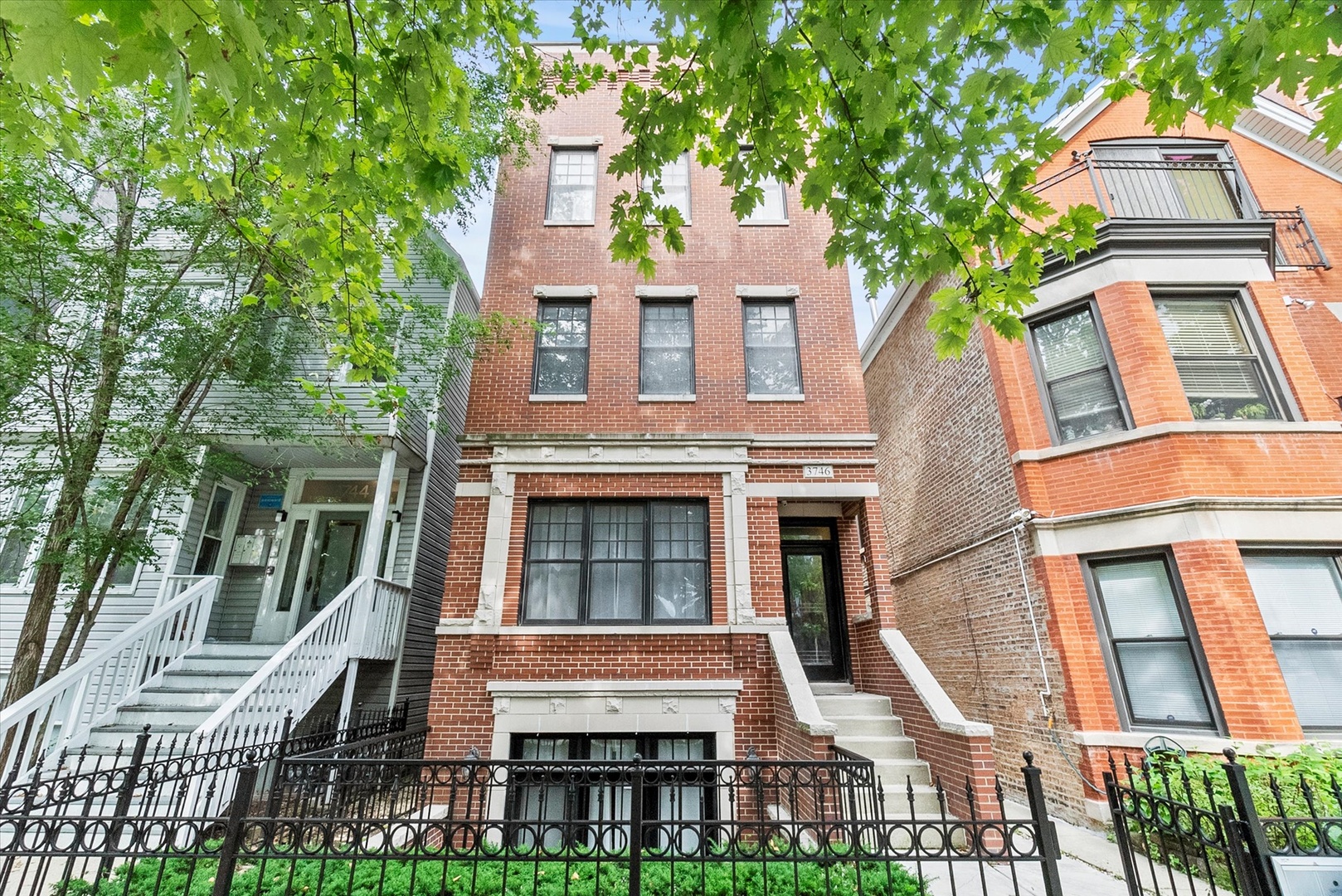 Rarely Available. An unparalleled opportunity to own this beautiful large 3,200 sq. ft. residence featuring 4 BEDROOMS and 2.5 BATHROOMS, situated in the coveted LAKEVIEW area of Chicago, is impressive. Steps from WRIGLEY FIELD on a tranquil quiet one way street, this stunning four bedroom duplex is ideal for modern urban living. Recently updated, this home features spacious and comfortable rooms, complete with two fireplaces, a powder room, sauna/steam shower, and wet-bar.  The chef's kitchen boasts white cabinets and granite counter tops, new stainless steel appliances, and a breakfast bar perfect for entertaining. Continuing to the first floor primary suite, the bath has a spa-like massage tub, separate shower, and double sink - a perfect retreat after a long day. Garage parking spot included in the price and super Low HOA fees. Located near the highly rated Blaine School District, and accompanied by many restaurants/bars on a quiet street with convenient access to public transportation, this home is a true find - offering the perfect blend of luxury living and everyday convenience. This will not last long... It's the BEST VALUE on the market in Southport Corridor - rated a haven for families to enjoy all the city has to offer - great theater, restaurants and shopping.