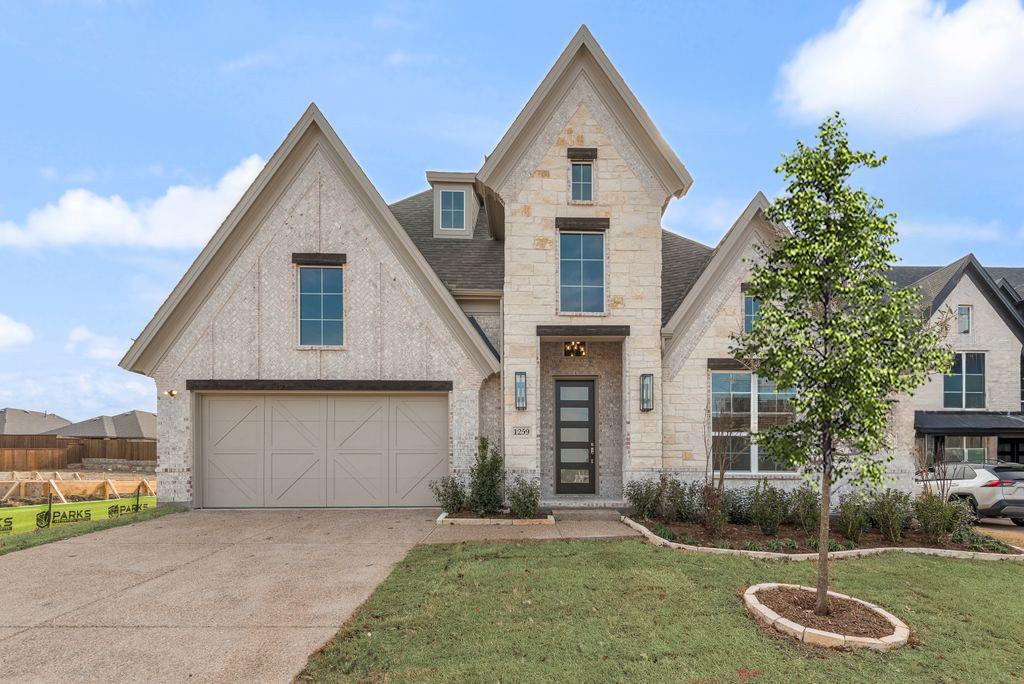Experience luxurious living in this brand-new Grand Home with a 1 story design and a 3 car garage! Located in Monterra, a premier master-planned community offering exceptional amenities, including a swimming pool, splash pad, scenic bike trails, a park, and pickleball courts. Nestled within the highly acclaimed Rockwall ISD, this beautiful north-facing one-story home features four spacious bedrooms and a three-car garage, all just a short walk from the neighborhood park and pool.The open-concept family room showcases wood floors and a cozy fireplace, seamlessly connecting to a large covered back patio—perfect for entertaining or relaxing outdoors. The gourmet kitchen is a chef’s dream, complete with a generous island, Omegastone slab countertops, elegant white Shaker cabinets, deep full-bowl sink, stainless steel appliances, a five-burner gas cooktop, pots and pans drawers, a large walk-in pantry, and a built-in trash drawer.A flexible layout provides space for a formal living room or home office, while the downstairs media room can easily serve as a kids’ game room or additional entertainment area. Custom finishes include 8-foot doors, pre-wiring for flat-screen TV, and beautiful wood flooring. The primary suite offers a luxurious retreat with a freestanding soaking tub, glass-enclosed shower, dual sinks, and an expansive walk-in closet.Energy efficiency is built into every detail with Energy Star certification, R38 insulation, and a tankless water heater. Enjoy the perfect blend of comfort, style, and convenience—just minutes from Lake Ray Hubbard, with abundant shopping and dining nearby.