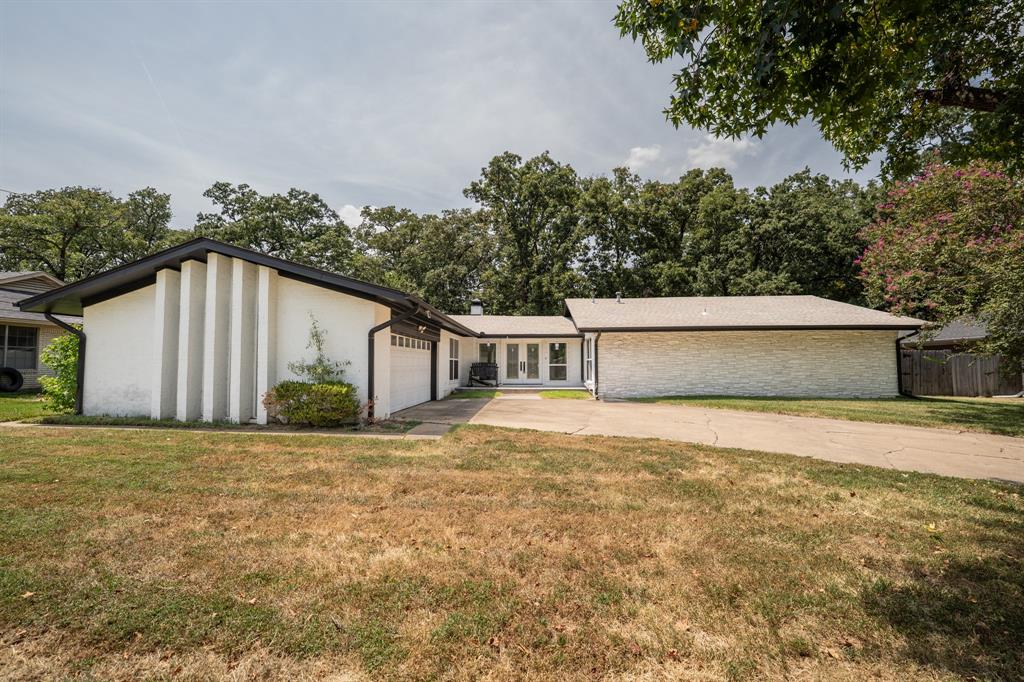 Nestled in an established neighborhood at the end of a cul-de-sac, this three-bedroom, three-full-bathroom brick home has space designed for easy everyday living. The vaulted living room serves as the perfect centerpiece for both quiet family evenings and entertaining guests. Adjacent to the main living area, the generously sized kitchen has granite countertops, stainless steel appliances, abundant cabinetry, and plenty of prep space to make mealtime an absolute breeze. 3 large guest bedrooms are another complement of this home. The primary suite has two full bathrooms. Outside, you'll have a fully fenced backyard with mature trees, privacy fencing, and plenty of space for pets or a garden. A 20x15 storage building in the yard offers possibilities for a workshop, lawn equipment storage, or extra hobby space.