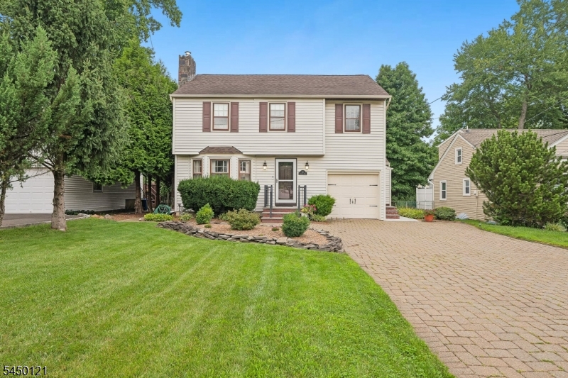 HIGHEST AND BEST DUE WEDNESDAY 8/19/2026 AT 12PM. Beautifully updated and filled with natural light, 611 Brookside Place blends timeless character with modern comfort in one of Cranford's most desirable neighborhoods. This 3-bedroom, 1 full and 1 half bath Colonial offers thoughtfully designed living spaces and a spectacular rear family room that truly sets the home apart.The main level offers a comfortable flow from the living room to the dining room and updated kitchen, creating inviting spaces for everyday living and entertaining. At the rear of the home, the impressive family room features soaring ceilings, an exposed brick fireplace, and walls of windows that fill the space with natural light, creating a warm and inviting place to gather year-round. Just off the family room, the rear deck overlooks the backyard, creating a natural extension of the home's living space and making indoor-outdoor entertaining feel effortless.Upstairs, three generously sized bedrooms and an updated full bath complete the home's thoughtfully designed layout.Conveniently located just minutes from downtown Cranford's shops, restaurants, parks, and NYC transportation, 611 Brookside Place offers the perfect combination of character, comfort, and location.
