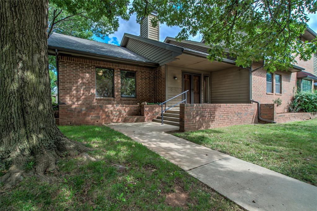 Look no further! This ONE LEVEL Condo is located close to all the amenities! Freshly painted and move in ready! True Hardwood floors in the living, dining room, and kitchen set the tone for the space! There are built in cabinets and shelves, and a wet bar is also in this massive living space! The Kitchen has ample storage with lots of cabinets, drawers, and a movable island! The two bedrooms are both set apart with walk in closets in both, and Full bathrooms with each. There is a separate hallway with additional closets and storage space as well as the laundry area. The Master Bath has been upgraded with a walk in tub, and it has dual vanities, and a separate shower. There is also Courtyard access with a Private Deck (Fully Fenced) off this room or you can access it from the attached 2 car garage. This home has tall ceilings and luxury vinyl flooring in the bedrooms. The HOA fee ($423.50 a month) includes the Insurance (Exterior), Roof, Water & Garbage Bill, Common area gardening, sprinkler systems, trees, the Pool, Clubhouse, Tennis Courts, and Gated Entrance System. Come see it today!