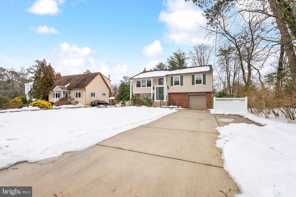 Now available in the desirable Lake Pine community of Medford! This well-maintained 3-bedroom, 2-bath split-level home offers a comfortable and functional layout. The upper level features all three bedrooms, an updated kitchen with stainless steel appliances, a dining area, a bright living room, and a full bath. The lower level provides an expansive family room with plenty of space for relaxing or entertaining, highlighted by a gas fireplace with adjustable temperature control. This level also includes a half bath, laminate flooring, a laundry area, and access to the attached one-car garage with additional storage. Step outside to a fenced backyard with a newer privacy fence and a beautifully landscaped yard, easily accessible from the lower level. Buyers have the opportunity to become members of the Lake Pine Colony Club, offering lake access for swimming and fishing. Conveniently located near shopping, dining, and major routes, this home offers the perfect blend of comfort, lifestyle, and location. Sale based on sellers finding suitable housing, actively looking.