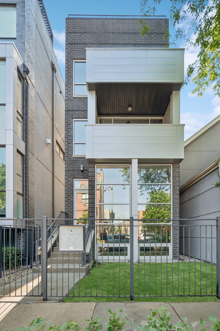 Bright and spacious newer construction penthouse home in the heart of East Village offering three outdoor spaces including a private roof deck. This dramatic two-bedroom two bath home features soaring 11-foot ceilings and 8-foot doors throughout with east facing floor to ceiling windows showcasing stunning city views.  Large open kitchen with ample storage space features stainless steel Bosch appliances, stone countertops, custom tiled backspace and island with seating.  Spacious wide living room with designated space for a dining room opens to a front deck overlooking tree-lined Honore street. Wonderful primary suite with large walk-in closet, full marble bath with double vanity, heated floors, heated towel bars and oversized steam shower with rain and separate hand wand. Sunny well-appointed second bedroom with generous wall of closets.  Interior staircase accessible from inside the home takes you to a private rooftop deck finished in synthetic decking / astroturf and boasts unobstructed city views.   Roof deck with water and gas hookups perfect for outdoor grilling / kitchens and gardens.  Rich hardwood floors throughout, ample closet and storage space with additional storage in the building.  Well maintained three unit building with strong association.  Walk to everything along Division / Chicago / Damen Avenue and steps from Kasama.