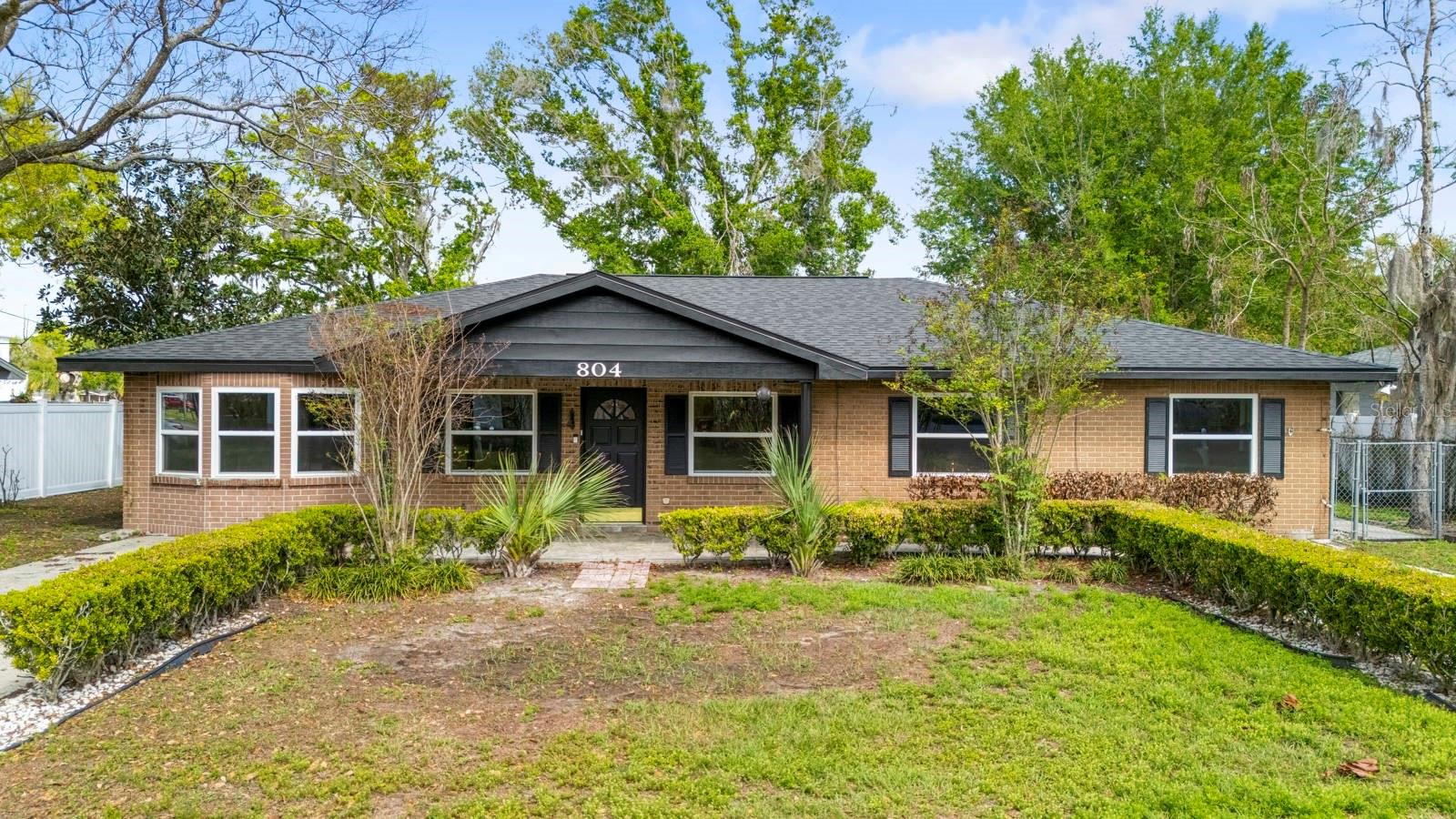 Beautifully renovated ranch-style 3-bedroom, 2-bath home on nearly 1/4 acre (.24) in Plant City! Great outdoor space with large backyard. Inside you’ll find luxury vinyl plank flooring throughout with tile in the bathrooms. The updated kitchen features new stainless steel appliances, abundant cabinetry, quartz countertops, and a tile backsplash. Recent upgrades include NEW WINDOWS (2023) and a NEW ROOF (2024). Enjoy outdoor living with a front porch and a large screened lanai with pavers, perfect for relaxing or entertaining. The property also includes two storage sheds for additional storage. Conveniently located just minutes from I-4 and close to shopping and restaurants, making commuting and everyday errands a breeze. Move-in ready with major updates already completed!