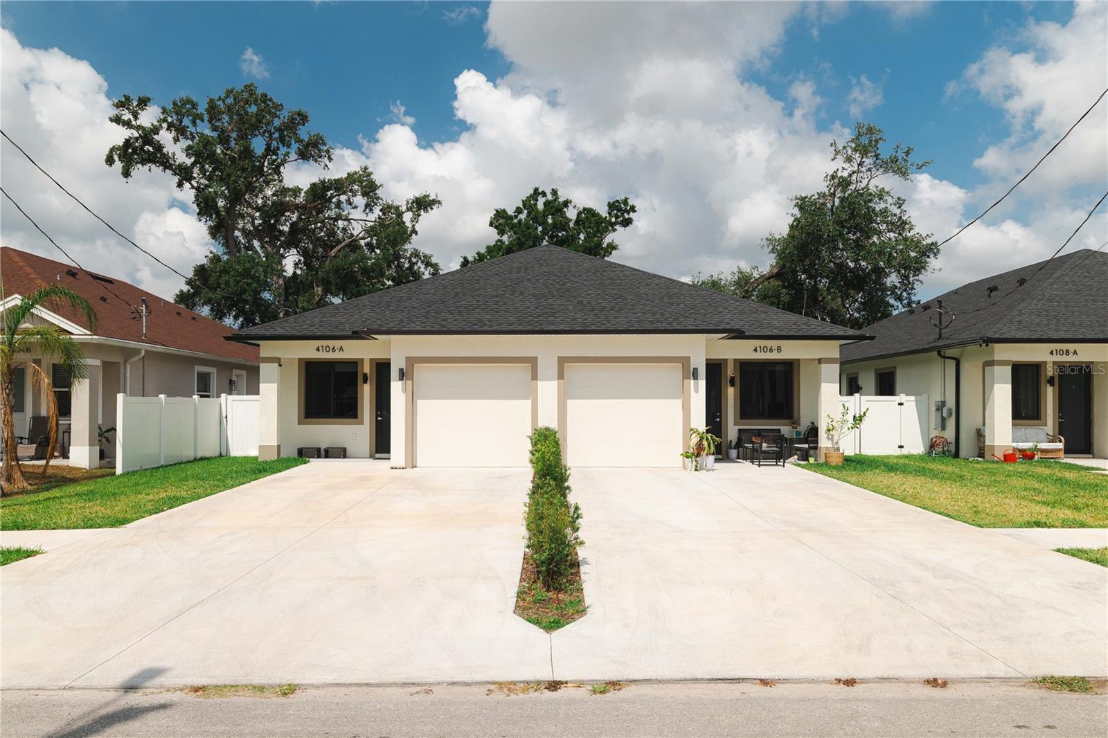 Under contract-accepting backup offers. Under contract-accepting backup offers. Turnkey Tenant-Occupied Duplex – 2024 Construction in High-Demand Drew Park Investor-ready and fully leased! This 2024-built duplex in Tampa’s centrally located Drew Park offers immediate cash flow with existing tenants in place. Each unit features a modern 3-bedroom, 3-bath villa layout with a 1-car garage—designed to appeal to today’s renters seeking privacy and functionality. Each spacious bedroom includes its own private en-suite bathroom, significantly boosting rental potential, especially for shared living or student housing scenarios. The open-concept layout includes a contemporary kitchen with island seating, abundant cabinetry, and a complete set of brand-new stainless steel appliances: French door refrigerator, smooth-top range, dishwasher, and microwave hood. Additional investor-friendly highlights: Fully fenced backyards and parking for 3 vehicles unit Washer/dryer hookups in each garage Modern finishes throughout Water, sewer, trash, and lawn care included in rent Tenants benefit from an optional Resident Benefits Package (utility concierge, filter delivery, maintenance portal) Located just steps from Hillsborough Community College and close to Tampa International Airport, International Plaza, and major highways, this property is ideally positioned in one of Tampa’s most active rental markets. This is a low-maintenance, opportunity perfect for investors seeking immediate returns and long-term growth in a prime location.