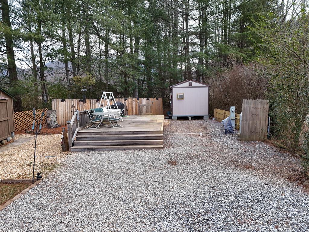 Welcome to this beautiful RV Lot in the desirable Choestoe Valley RV Park. Nice size lot with an Outbuilding with Electric, Air Conditioner, washer/dryer hookups, and a small refrigerator. Small shed for garden tools. Enjoy the nice-sized deck, perfect for entertaining or simply soaking up the peaceful surroundings with 2 grills and a table and chairs. Location is everything: you're just a short drive from Helton Creek Falls, a beautiful double-waterfall hike just south of Vogel State Park.  And of course you're near Vogel State Park itself, with its scenic lake, trails, and outdoor amenities.  Also nearby is Brasstown Bald, Georgia's highest point, offering stunning panoramic mountain views. With an HOA fee of just $695, you'll enjoy worry-free living that covers sewer, water, trash, lawn mowing, and Wi-Fi. Call me today!