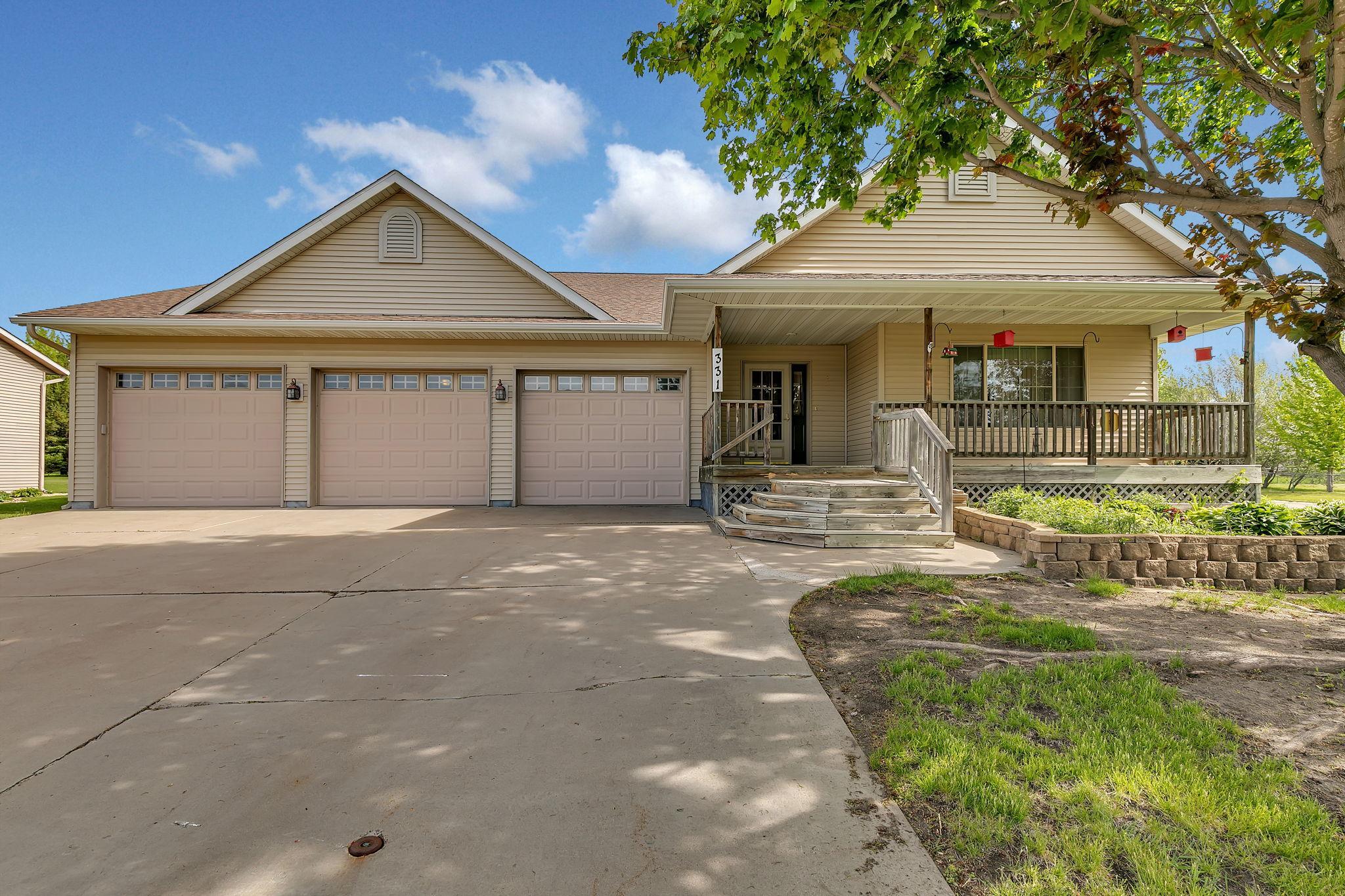 Amazing custom ranch home on a large corner lot. 3 BR, 3BA home with a main level primary suite and main level laundry.  Close to the Wobegon Trail, Albany Golf Course, schools and more.   New roof, newer refrigerator, microwave, and dishwasher. Large office/den with an open floor plan on the main level along with a gas fireplace in the living room area. Large walk-in closets for storage. Fully finished lower level with lots of storage, 2 BRs, 1 BA and a HUGE family room.  The heated/insulated garage is a hobby enthusiasts dream...3 garage doors with an extra 14x36 workshop.  No need for an extra shed when you have this huge work space. Lots of room for storage, boats, UTVs. Relax on the covered front porch or the backyard deck. This home is move-in ready and available for a quick close.