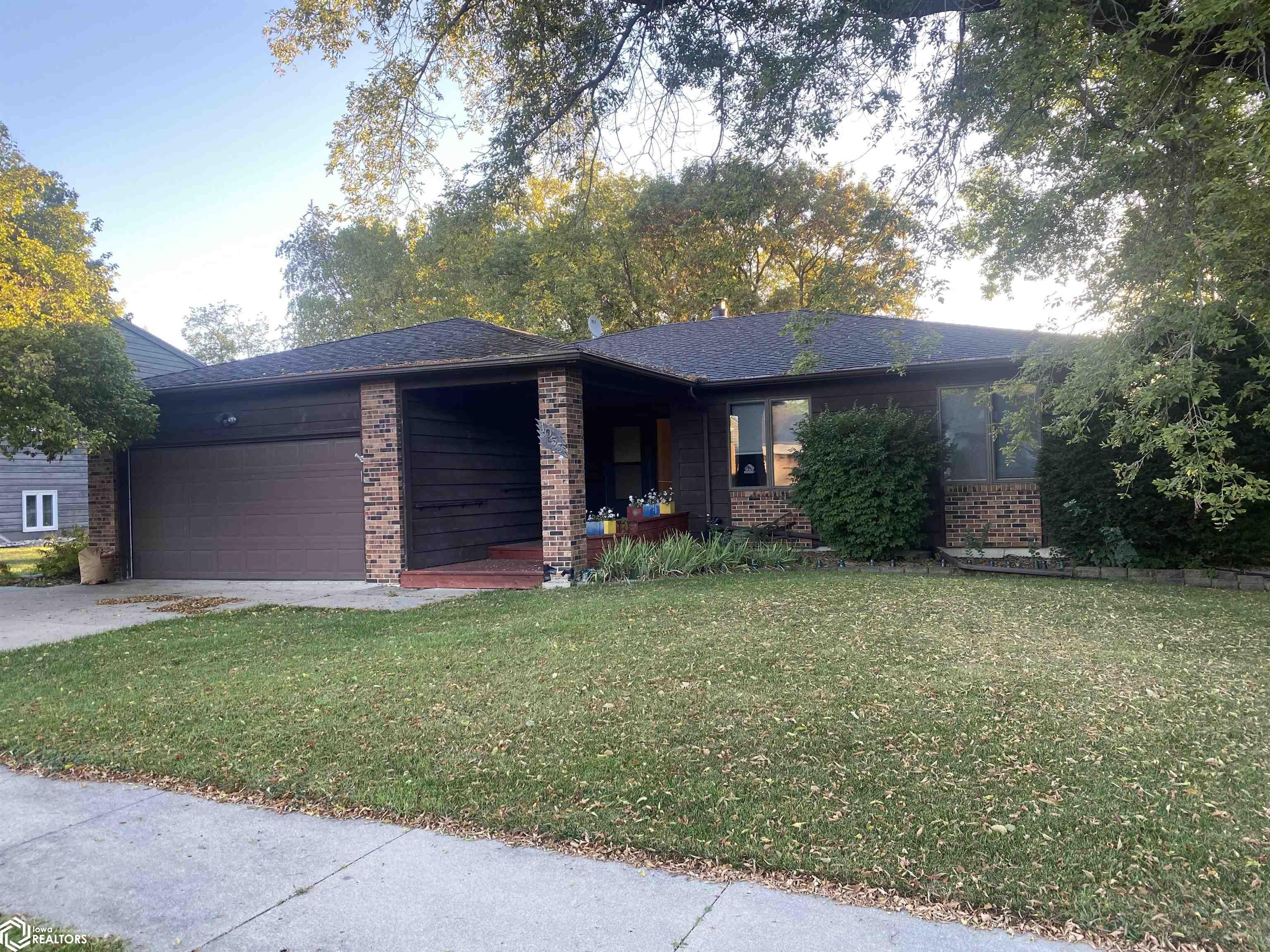 Spacious four bedroom home conveniently located near Briarstone Lake.  The main floor features a centrally located kitchen with the dining room and living room off each end. Screened in porch to the back of the home with a large deck for relaxation. Main bedroom with bath and two other bedrooms and a bathroom. Laundry Conveniently located on the main level with basement featuring one bedroom, one bathroom and open family room area as well as a little workshop. You may want to put your personal touch into this home, but it is move-in ready call a realtor today to view this property.