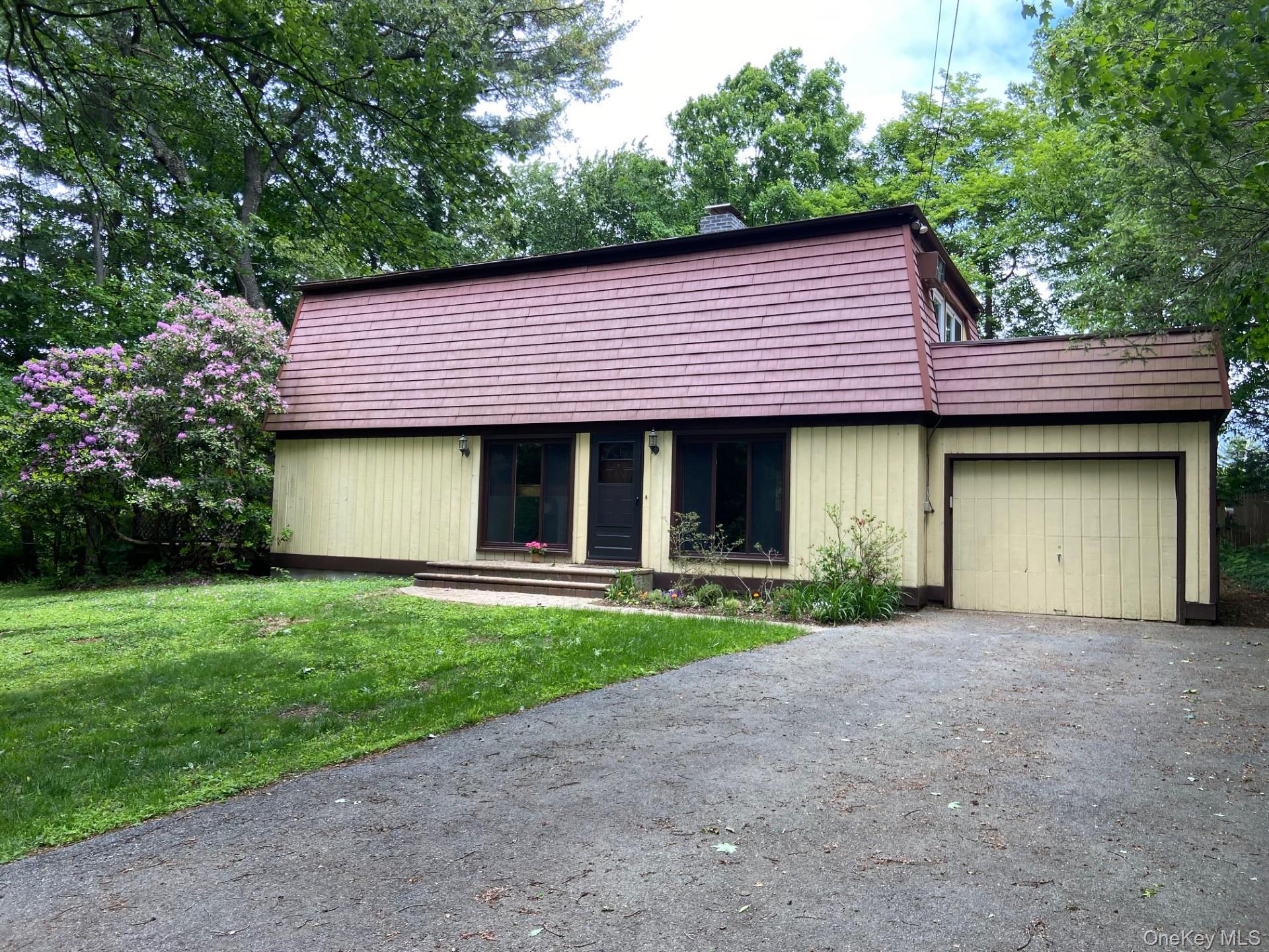 Located in the highly sought after Chappaqua Central School District in the desirable Smith Park neighborhood, this one of a kind Contemporary with striking Modern Mansard architecture. Offering open concept living, soaring 12 foot ceilings in the dramatic living room with fireplace, clean architectural lines, and expansive windows, this home is filled with natural light and designed for today’s modern living.The unique exterior blends texture and style while seamlessly connecting indoor and outdoor spaces. Enjoy entertaining or relaxing on the expansive deck, private balcony off the primary bedroom, and charming Juliet balconies from bedrooms two and three overlooking the peaceful property. Recent upgrades include a new roof, new above ground oil tank, freshly painted interior, one car attached garage, and abundant basement storage. Set on a level .29 acre property just minutes to downtown Chappaqua, Metro North train, parks, restaurants, shopping, farmers market, hiking trails, and top rated Chappaqua schools, this exceptional home offers the perfect blend of architectural character, suburban convenience, and Westchester County living.