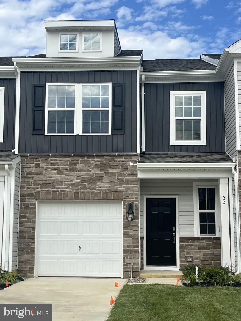 1-year new townhome. Easy access to major highways. Fall in love with this beautiful, finely appointed townhome featuring vinyl plank flooring on 1st floor, carpet on 2nd floor, modern kitchen with like new appliances, 2nd floor laundry were washer and dryer are included, 1st floor storage area, 1 car garage, lawn sprinkler system all backing to a tranquil tree lined views.