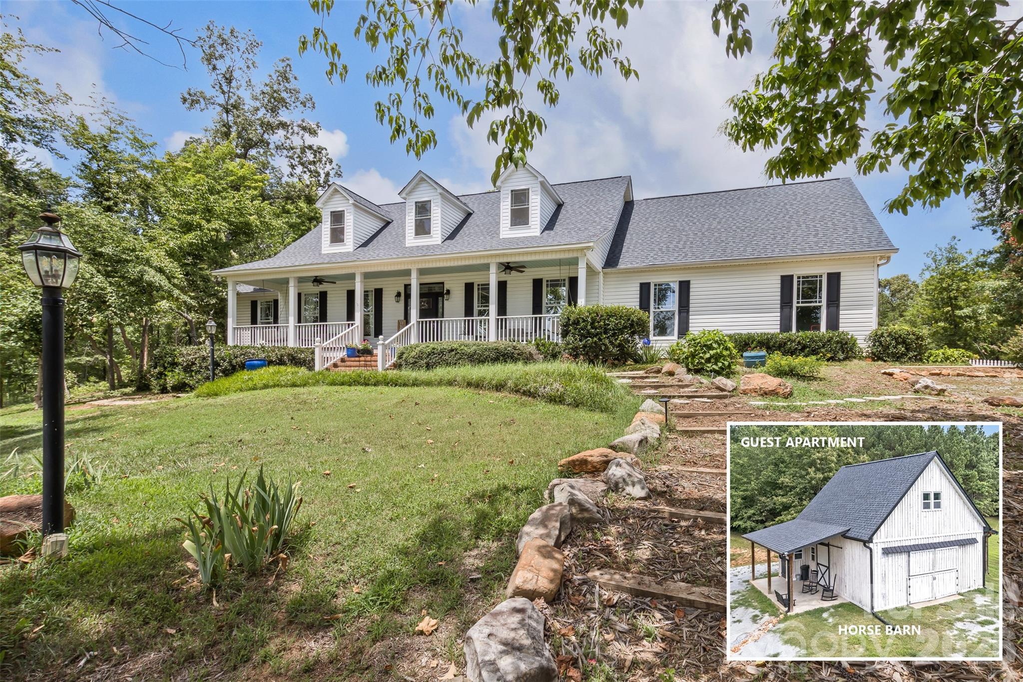 Now offered as 378 & 374 Collinsville Road—a rare opportunity to own a beautifully updated equestrian estate featuring a stunning main residence and a separately addressed two-story equestrian barn with a fully permitted upstairs apartment with its own well, septic, and electrical service. From the moment you enter the maple-lined driveway, you'll appreciate the privacy, breathtaking mountain views, and unforgettable sunsets that define this exceptional property. The main home offers vaulted ceilings, abundant natural light, hardwood flooring, updated kitchen cabinetry and countertops, fresh interior paint, new HVAC systems (2024), a new roof (2024), encapsulated crawlspace, updated baths, and a flexible floor plan with multiple ensuite options, a dedicated home office, library/sunroom, spacious loft, oversized walk-in attic, and an attached two-car garage with built-in storage and gym features. Outdoor living is equally impressive with expansive front and rear porches, a two-level trellis deck pre-wired for a hot tub and outdoor kitchen, a fire pit, greenhouse, garden shed, and raised-bed garden. The fully renovated two-story barn features two horse stalls (can modify to four stalls), a temperature-controlled tack room, half bath, concrete floors with stall mats, and a beautifully finished upstairs apartment complete with a full kitchen, full bath, and washer/dryer hookups. The barn can easily be expanded to four stalls and offers a level area ideal for a round pen or riding arena, with additional pasture expansion potential. Two fenced paddocks with run-ins, trails throughout the property, nearby Collinsville Equestrian Trail (CETA) access, and a location just 15 minutes from Tryon International Equestrian Center complete this one-of-a-kind offering. NEARLY $200K IN UPDATES/IMPROVEMENTS SINCE 2024!! An extensive list of renovations, upgrades, and features is attached to the listing and available upon request. Co-listing agent is an owner.