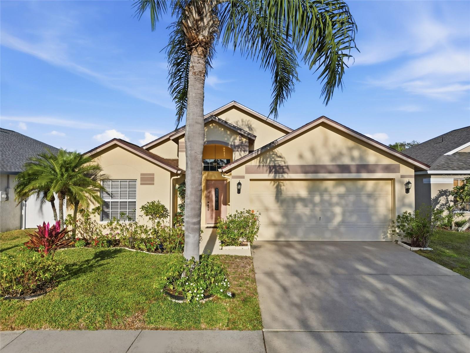 Welcome to Sterling Ranch, a desirable community pool neighborhood in Brandon featuring low HOA fees, convenient access to I-75 and the Crosstown Expressway, and a quiet suburban setting close to Tampa. This well-maintained 3-bedroom, 2-bath home offers a (NEW ROOF 2025), (AC 2017), and (WATER HEATER 2021), providing peace of mind for buyers.Inside, enjoy luxury vinyl plank flooring, vaulted ceilings, and an open floor plan ideal for everyday living and entertaining. The family room flows into the kitchen, which features ample cabinetry, a snack bar, and a GAS RANGE—a rare find. Dining options include a casual dining nook plus a spacious formal dining room.A bright Florida room extends the living space, perfect for relaxing or hosting guests. The private primary suite is tucked toward the rear of the home and features dual sinks, a garden tub, a walk-in closet, and space for a king-sized bed. Two secondary bedrooms are located on the opposite side of the home and share a full bath, offering a desirable split-bedroom floor plan.The fully fenced backyard is accented with fruit trees and palms, creating a peaceful outdoor retreat. Additional features include a 2-car garage and access to community amenities.