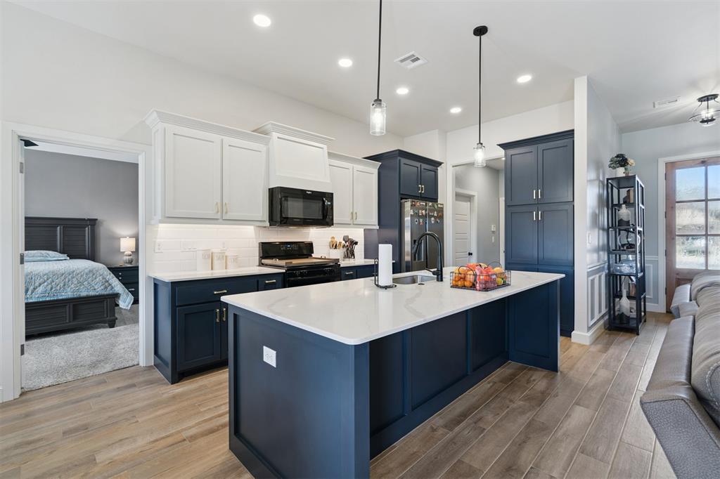 **Priced Below Market Value! Owner VERY motivated to sell** Located in the sought-after St. James Addition, where upscale living meets exceptional community amenities including a clubhouse, resort-style pool, & gym. Inside, soaring 10-foot ceilings extend throughout the entire home, creating an open, airy feel. Lovely inlays & abundant canned lighting lead into light-filled living spaces enhanced by large bay windows overlooking the backyard. The kitchen is designed with granite countertops, a spacious island featuring a wash basin sink, under-counter lighting, and a large tile backsplash. Whirlpool gas stove, microwave, and dishwasher—offer both style and performance. Tile flooring, elegant pendant lighting, & a chandelier over the dining area complete this sophisticated space. The primary suite features a generously sized bedroom with 2-inch wood blinds, & plush carpeting. The primary bath includes a dual vanity sink, separate shower, large garden tub, & private toilet space. Additional highlights include a mudroom entry from the garage, a dedicated laundry room with cabinetry, granite countertop, & tile flooring. Thoughtful lighting is found throughout, enhancing both functionality & ambiance. Step outside to enjoy a large covered back patio with beautiful wood ceiling accents—perfect for entertaining or relaxing. A gas line is already in place for a grill or hot tub. Blending elevated finishes with everyday comfort, & enhanced by the exclusive amenities of St. James Addition, this home offers a lifestyle of elegance, convenience, & community. Minutes from university campus, entertainment, & shopping districts.