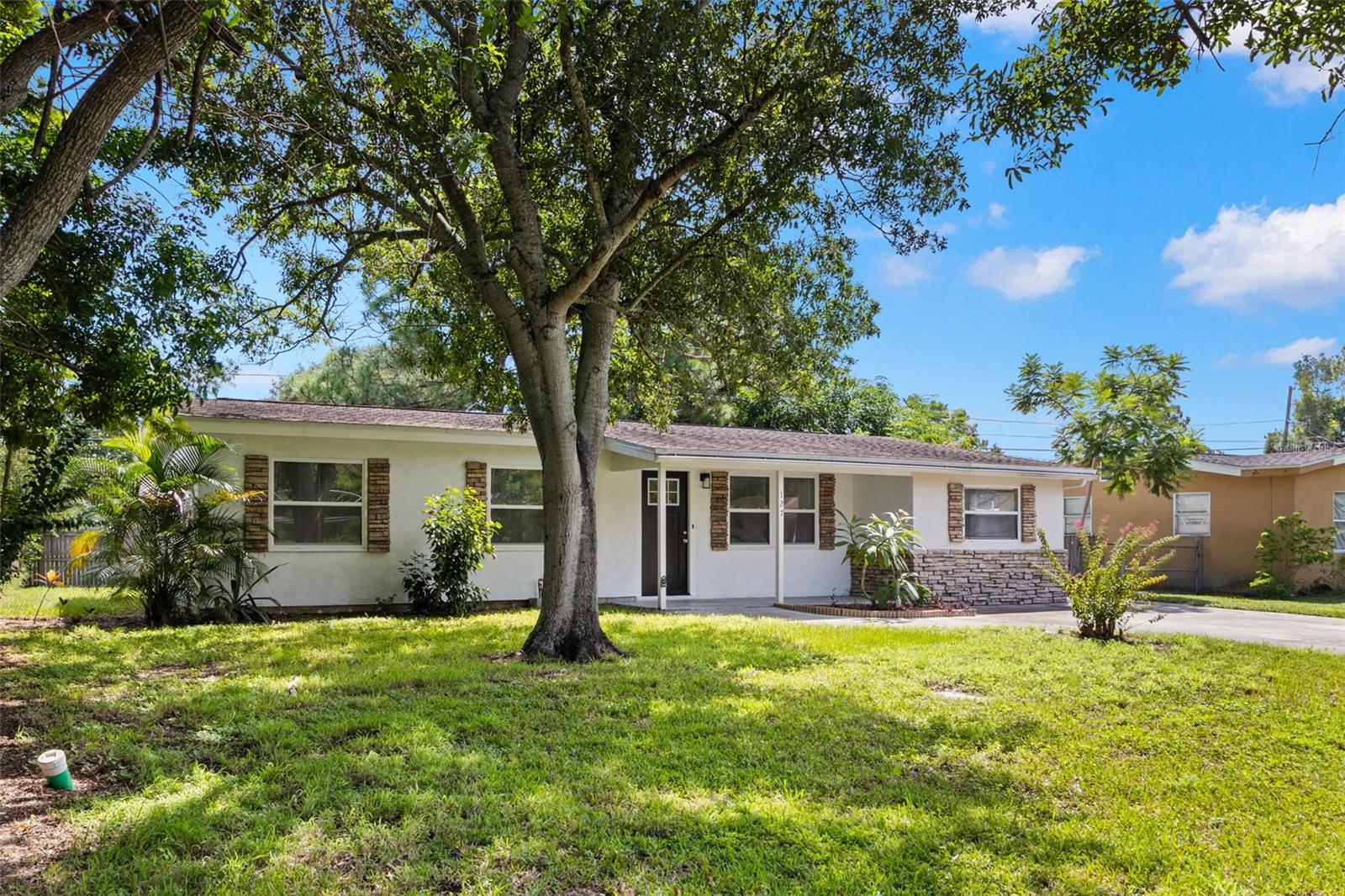 Welcome to 127 Emerald Ln, a charming 3-bedroom home in the heart of Largo and in a NON FLOOD ZONE! This move-in ready property is perfect for a first-time homebuyer or as a smart investment for those looking to take advantage of Largo’s strong rental market, including short-term rental opportunities. Step inside to find a bright and inviting living space with beautiful flooring, fresh paint, and a versatile layout. The French doors open to an additional flex space, while the separate utility room with full full size washer and dryer hook ups offers convenience and extra storage. Enjoy a spacious backyard with room to entertain, garden, or simply relax under the Florida sunshine. This home’s location is unbeatable—you’ll be just minutes from the award-winning Gulf beaches, Largo Central Park, Highland Recreation Complex, and the Largo Cultural Center. Golf enthusiasts will love being close to popular courses like East Bay Golf Club, and everyday conveniences are right at your fingertips with shopping, dining, grocery stores, and medical facilities nearby. Easy access to US-19 and Ulmerton Rd makes commuting to St. Pete, Clearwater, or Tampa a breeze, and both Tampa International Airport and St. Pete–Clearwater Airport are less than 30 minutes away. Whether you’re looking to make it your first home, a seasonal retreat, or a profitable rental, this property checks all the boxes!