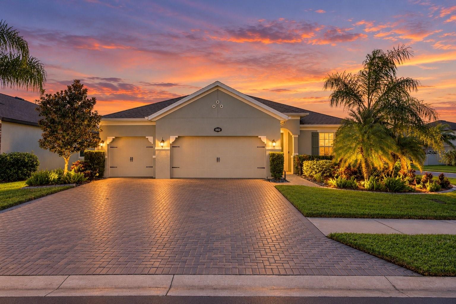 Welcome to the lifestyle you've been searching for in the highly desirable Long Lake Ranch community of Lutz! Perfectly situated on a spacious corner lot, this beautifully maintained 4-bedroom, 3-bathroom, single-story home with 2,762 square feet, a 3-car garage, and a roof less than two years old offers the perfect blend of space, comfort, and effortless Florida living.From the moment you step inside, you'll appreciate the bright, open-concept floor plan, tile flooring throughout, and thoughtfully designed split-bedroom layout that provides privacy and flexibility. With bedrooms positioned in separate areas of the home, everyone can enjoy their own space while still coming together in the heart of the home. The spacious kitchen is a true centerpiece, featuring an impressive oversized island that's perfect for entertaining, casual dining, and gathering with friends. Seamlessly opening to the living and dining areas, this inviting space makes everything from everyday living to hosting memorable celebrations feel effortless.Step outside and discover a backyard filled with possibilities! Whether you envision a tropical garden, custom outdoor kitchen, extended patio, or your very own private oasis, this blank canvas is ready to bring your outdoor living dreams to life. Add in the peace of mind of a roof less than two years old, and this home offers both exceptional potential and practical value. Life in Long Lake Ranch is about so much more than the home itself.  This beautifully maintained, master-planned community offers a welcoming neighborhood atmosphere and an incredible collection of resort-style amenities. Spend your weekends relaxing by the resort-style swimming pool, enjoying the picturesque 40-acre lake with fishing and (non-motorized) boating, shooting hoops at the basketball courts, or exploring the multiple playgrounds, tennis courts, dog park, and outdoor gathering spaces. With scenic surroundings and a genuine sense of community, it's easy to see why Long Lake Ranch is one of Lutz's most sought-after neighborhoods.Ideally located near highly regarded schools, shopping, dining, parks, and major commuter routes, this home provides convenient access to everything the Tampa Bay area has to offer while maintaining the peaceful, residential atmosphere that makes Lutz living so desirable.Come discover why so many love calling Long Lake Ranch home.