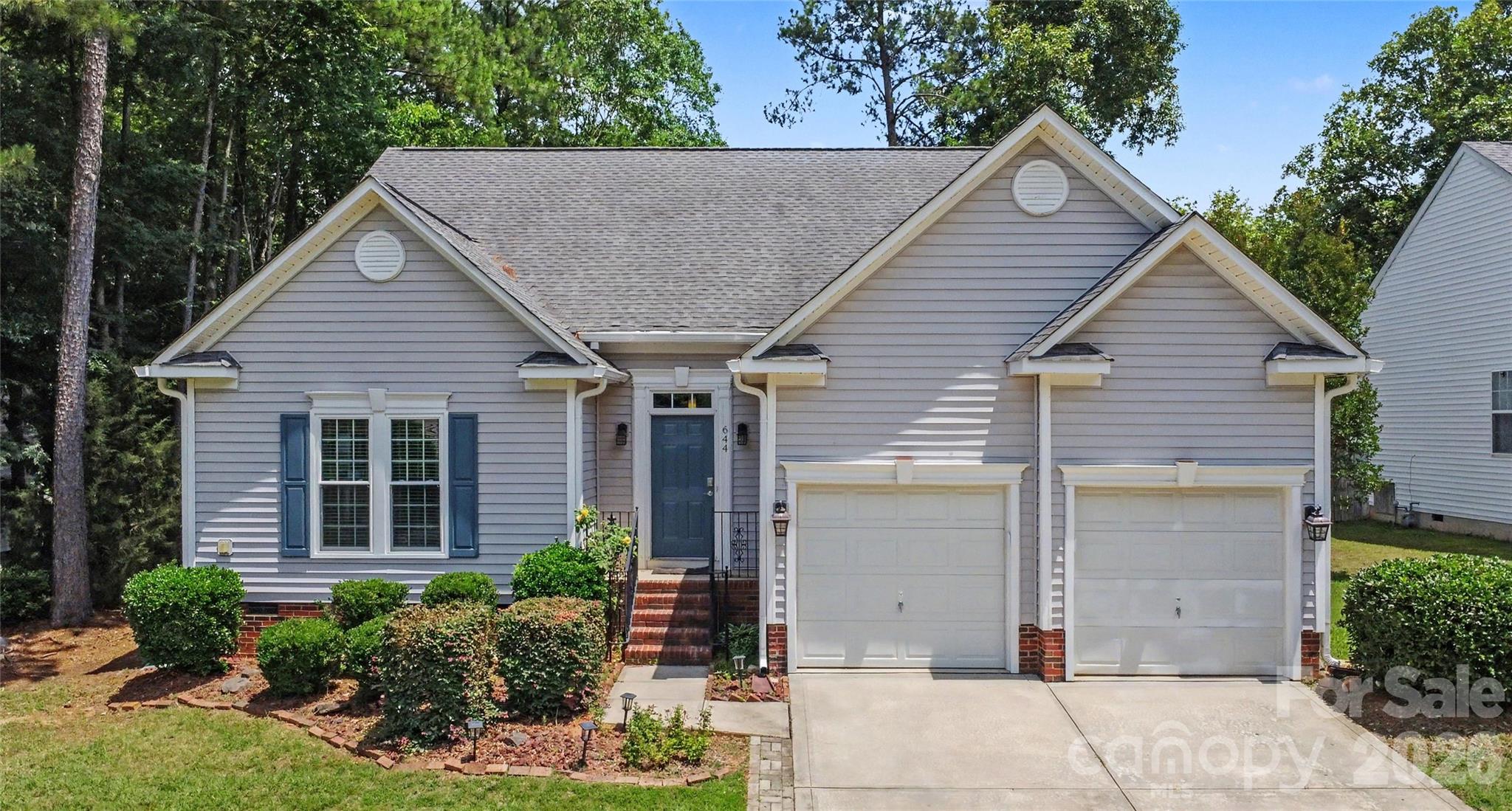 Check out this charming ranch home in Rock Hill, SC, where easy living meets Southern hospitality! Enjoy spacious interiors, a serene backyard, and a friendly community, all while being close to local amenities. This 3-bedroom, 2-bathroom residence offers beautiful hardwood floors throughout and soaring 10 ft ceilings in the common areas, creating an inviting atmosphere. The spacious kitchen opens directly to a large dining area and an oversized living room, perfect for entertaining family and friends. Cozy up by the gas fireplace on chilly evenings or step outside to enjoy the deck overlooking a serene wooded area and open pasture. The primary suite is a true retreat, complete with a garden tub, separate shower, large vanity, and a generous walk-in closet. Additional highlights include a two-car garage and ample storage solutions with large closets throughout the home. Located in the desirable Sunset Point neighborhood on the shores of Lake Wylie, residents enjoy access to an outdoor pool and boat storage. Conveniently situated minutes from Westminster Park, Rock Hill Park, shopping, dining, and I-77, this home offers the perfect blend of comfort and accessibility. Don’t miss out on this incredible opportunity for easy living