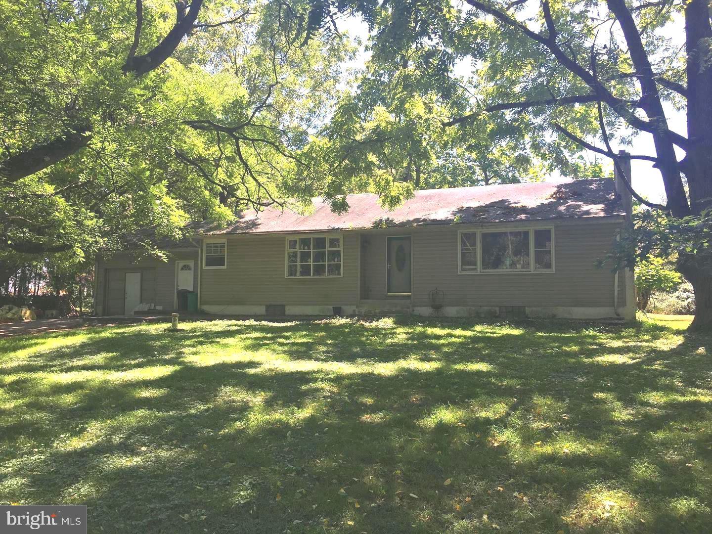 3 Bedroom ranch home on over  2 acre lot that has many possibilities.   Great location located in Middletown Township and the Neshaminy School District,  Many possibilities with this property!!   maybe knock the existing home down and  sub-divide and build new homes here,  also a  great location to store your equipment,  start a business or live in the property with a huge private yard that has plenty of trees surrounding the property for privacy.   Located near an economic zone  next to a  bank, professional offices, large chain pharmacy and a large commercial strip center,  located near all major roads for easy access,   there is an easement filed for public water and sewer hookup,  please check with Middletown Township for the list of possible uses for this property.