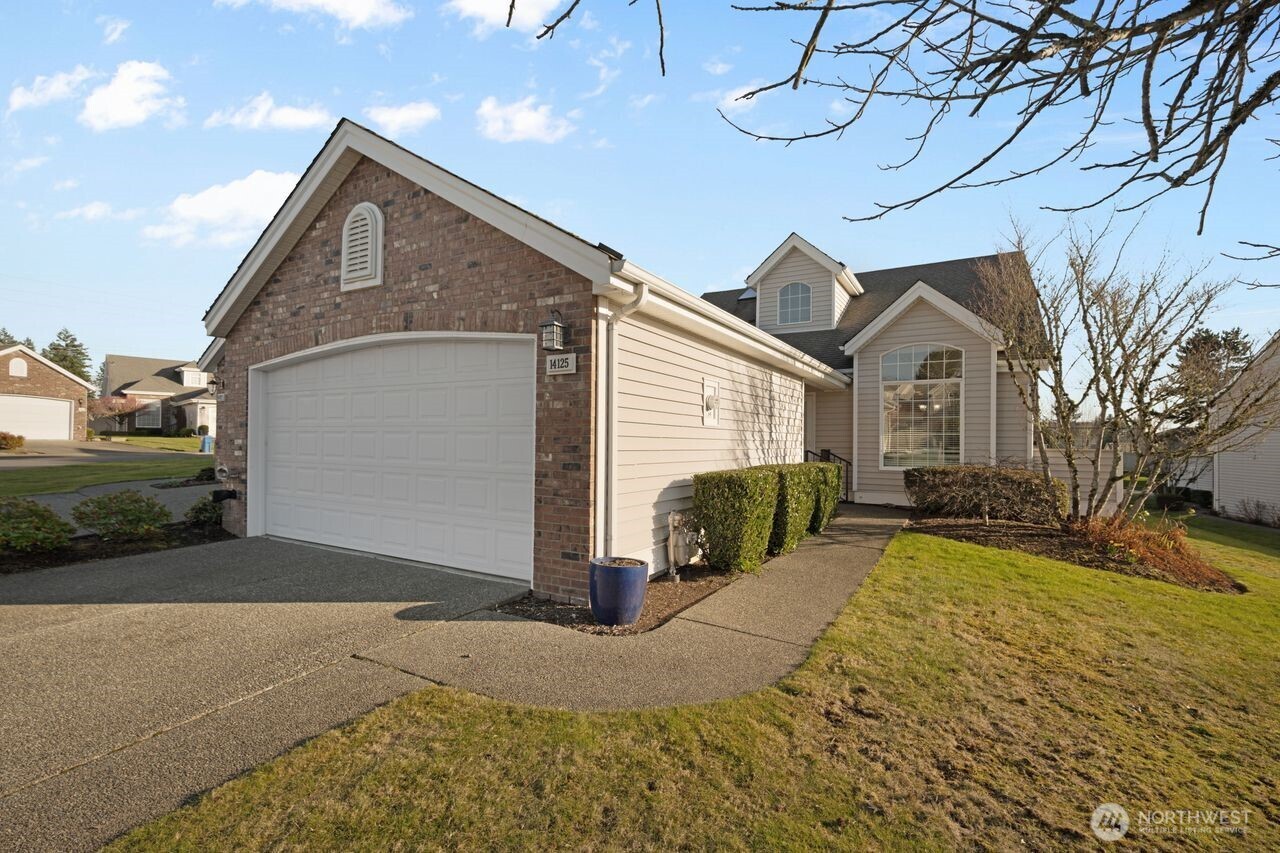 **NEW PRICE** Discover this lovely 2110 sq ft, 3-bedroom, 2.5-bathroom home located in the desirable Soos Creek Village community.  The main floor features a spacious primary suite complete with a large bedroom, private bathroom, relaxing soaker tub, and walk-in shower.  A convenient main floor bedroom/office offers the perfect space for work or quiet retreat.  Enjoy gatherings in the formal dining room and living room, highlighted by a cozy gas fireplace.  The kitchen includes a charming breakfast nook and newer stainless steel appliances. Upstairs is an additional bedroom, bonus room and full bathroom.  Additional updates include a newer furnace and air conditioning for year-round comfort and newer carpet.  Step outside to a composite deck overlooking the peaceful surroundings.  As an end unit, this home offers added privacy.  A perfect blend of comfort, style, and location—welcome home to Soos Creek Village.
