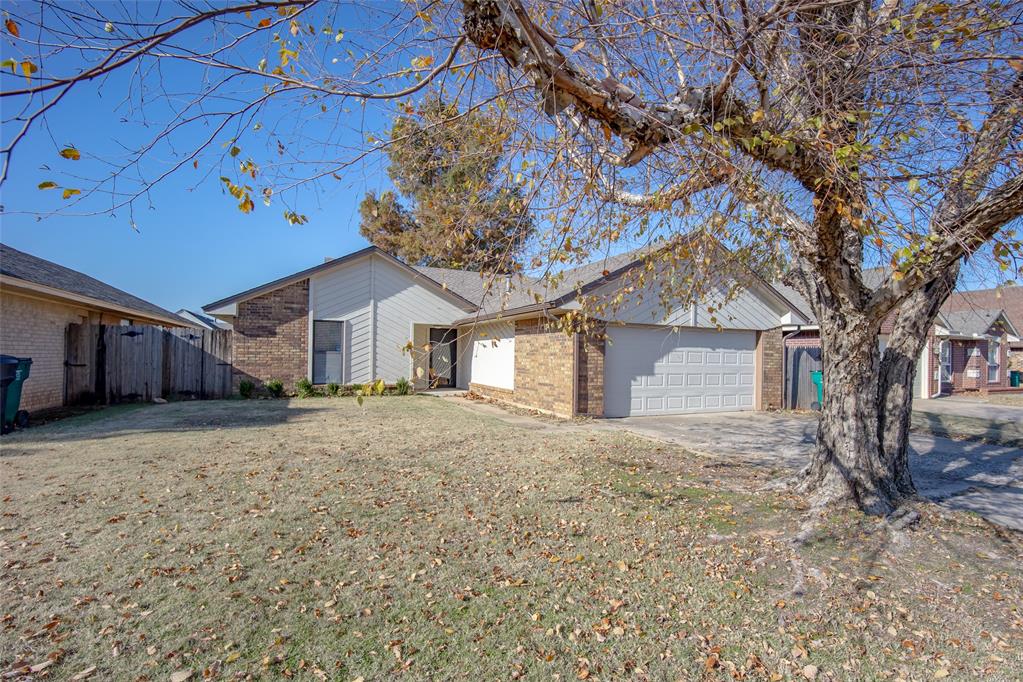 This completely updated home in SW OKC is move-in ready.  The floorplan maximizes space with the kitchen, living, and dining rooms open to each other. The living room is spacious with a wood burning fireplace, bar area, and an enclosed patio with tasteful finishes offering a 2nd living area which is not included in the square footage. The kitchen has all new quartz countertops, designer tile backsplash, stainless appliances, painted cabinets and updated hardware. The primary suite has a gorgeous en suite bathroom with updated tile, quartz counter top and a skylight for natural light. The primary bathroom includes double vanity, soaker tub, walk-in shower and very spacious walk-in closet. All flooring has been updated with new engineered hardwood floors, carpet and tile. The hall bathroom has also been updated with new tile, painted wood work and updated hardware. The secondary bedroom has two spacious closets. The AC condenser and coils were replaced July 2023.
