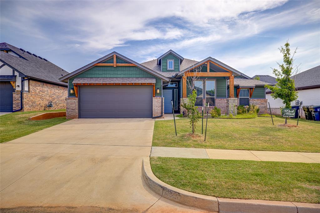 This listing features a stunning home in Red Canyon Ranch. The livingroom and kitchen are open with rich amenities. The livingroom boasts a cathedral ceiling and fireplace. The kitchen is equipped with a large island that is perfect for entertaining and food prep.  Add barstools to the island for additional seating. The quartz countertops add a touch of elegance.  In addition, the walk-in pantry is ready to store additional food and kitchen supplies.  The stainless steel refrigerator will remain with the home.  Step into the spacious primary suite and enjoy dual quartz vanities, a free standing tub, and a separate walk-in shower.  The walk-in closet is large enough for two.  The laundry room is conveniently located close to the two additional bedrooms.  The front loading, stainless steel washer and dryer will remain with the home.  The livingroom and three bedrooms come equipped with ceiling fans.  The covered patio is perfect for grilling, entertaining, and relaxing.  The backyard is spacious with a wooden and  brick privacy fence.  Red Canyon Ranch offers peaceful living, rolling hills, and a community playground.  This home was originally the builder's show home.