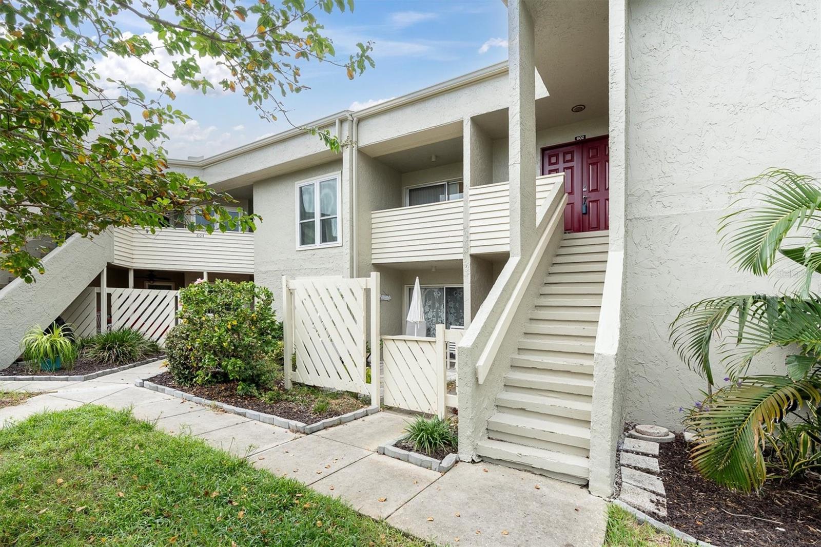Welcome to your waterfront retreat in Tarpon Springs on the beautiful Gulf of Mexico! This fully furnished second-floor condo offers two spacious bedrooms and two full bathrooms, making it the ideal winter escape, year-round residence, or income-producing investment. With no flooding or hurricane damage during last storm season, you can enjoy peace of mind while embracing the coastal lifestyle.
The interior has been thoughtfully updated with a modern kitchen, laminate flooring throughout, and the convenience of an interior washer and dryer. The primary bedroom features a generous walk-in closet and private access to a separate Florida room, creating the perfect spot to relax with a morning coffee or unwind after a day at the beach. The open layout fills the space with natural light and breezes, blending comfort with easy living.  This community is designed for leisure and connection, featuring a clubhouse with a fitness room, billiards table, TVs, a kitchen, and a sparkling community pool. Residents also enjoy a community pier and expansive green space, the perfect setting to take in the Gulf breezes, sunsets, and breathtaking waterfront views. Living here is about more than just the home—it’s about the lifestyle. Stroll along the Gulf, explore the historic sponge docks, or spend evenings at Sunset Beach, where free concerts bring the community together against the backdrop of unforgettable sunsets. Whether you’re looking for a seasonal getaway, a full-time residence, or a vacation rental, this condo captures the very best of Florida living