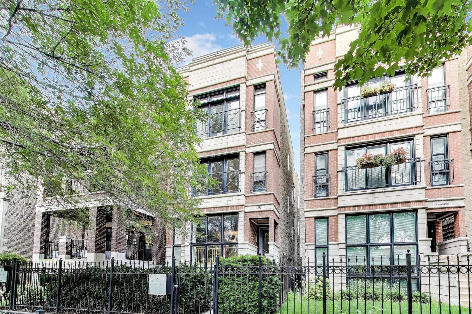 Sophisticated Lakeview Penthouse with Designer Updates and Private Rooftop Oasis  This exceptional 2-bedroom, 2-bath penthouse offers an unparalleled blend of modern elegance and prime Lakeview location. The sun-filled living and dining areas feature hardwood floors, a gas fireplace, and elegant finishes throughout. The recently enhanced kitchen features high-end stainless steel appliances, quartz countertops, and a wine refrigerator-perfect for both everyday living and entertaining. A spacious primary suite with room for a king bed and generous closet space.The second bedroom with flexible use as guest suite or home office. The primary bath has been gutted to create a spa-like experience. A fully upgraded private rooftop deck serves as a true extension of the home, offering panoramic city views, integrated water and electricity, a custom pergola, and multiple seating and dining areas-ideal for both quiet mornings and lively gatherings. In-unit laundry, attached garage parking, and ample storage are also inclusded. This well-maintained building is on a tree-lined street, just steps from the Southport Corridor, Wrigley Field, shopping, dining, and transit.