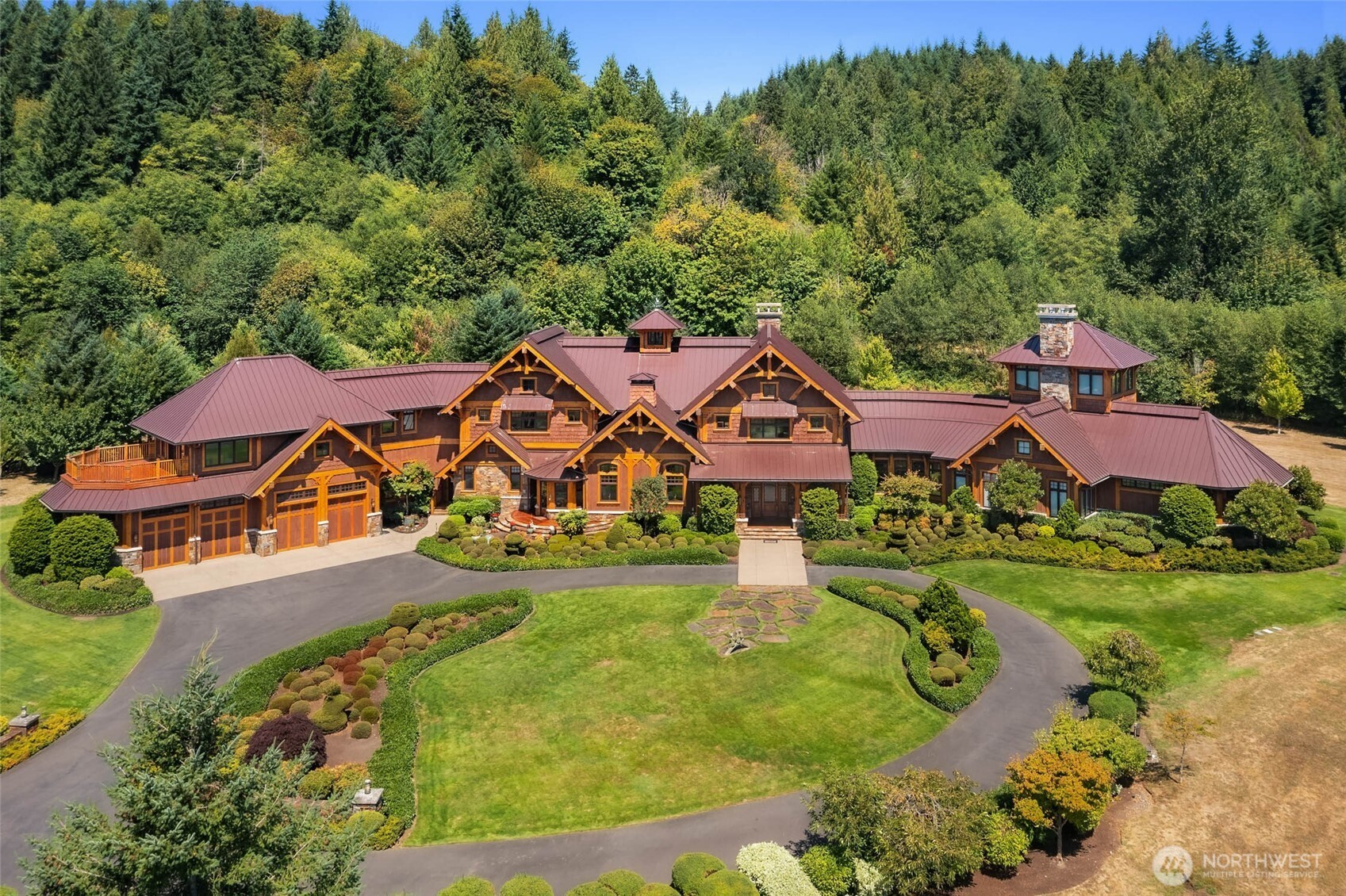 For sale for the first time; the Exclusive Elma Equestrian Estate.  One of the top Equestrian Estates in the Northwest which has produced numerous US National Arabian Champions and Rider Championships.  The sale includes a large 12,606 sf Krekow Jennings custom built timber frame 4 bedroom home. Within the primary home are 43 foot arched ceilings in the Great Room; and a fully appointed Kitchen with imported Clive Christian cabinets and a French Lacanche Range.  There is also a 3900 sf 4 bedroom second home and 2 bedroom apartment unit for caretakers and staff. Plus 9 barns and riding areas totaling 37,693 sf of covered space with 70 horse stalls. Including several fenced in level horse pastures on 3 separate tax parcels totaling 53 acres.