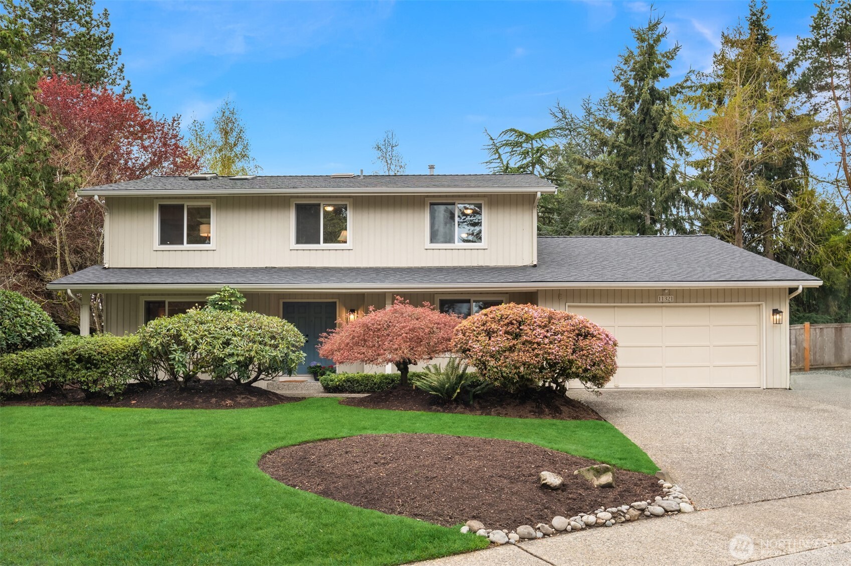 This beautifully updated 5-bedroom 3.25 bath, two-story classic in the heart of Kirkland's Finn Hill is well appointed with stylish comforts and room for all. Sited on a fully fenced 8,640 sq ft lot with serene outlooks, it's an oasis in the Hermosa Vista neighborhood. You'll love the natural light and desirable floorplan hosting a large culinary kitchen, spacious living, dining and family rooms. The expansive primary suite impresses with skylights, dual closets, and a private ensuite bath. Three additional inviting bedrooms complete the upper level, while the main floor features a spacious 5th bedroom or office with an adjacent ¾ bath and powder room. Enjoy the outdoors; a fully fenced yard, lovely patio and yard perfect for gathering and play. Convenient shed houses all your gardening needs. Recent upgrades include a brand-new roof, interior paint and lighting. Noteworthy's include; energy efficient heat pump heating, A/C, peek-a-boo Lake WA views, pull-down-stair garage storage and a third space driveway RV parking pad. Such a lovely friendly neighborhood to walk and take in the Lake Washington views. Convenient to shopping, schools, restaurants and coffee. Nearby to Denny, St Edward's and Juanita Beach parks. Highly rated Lake Washington schools. Preinspected + 1Yr Home Warranty. Welcome home!
