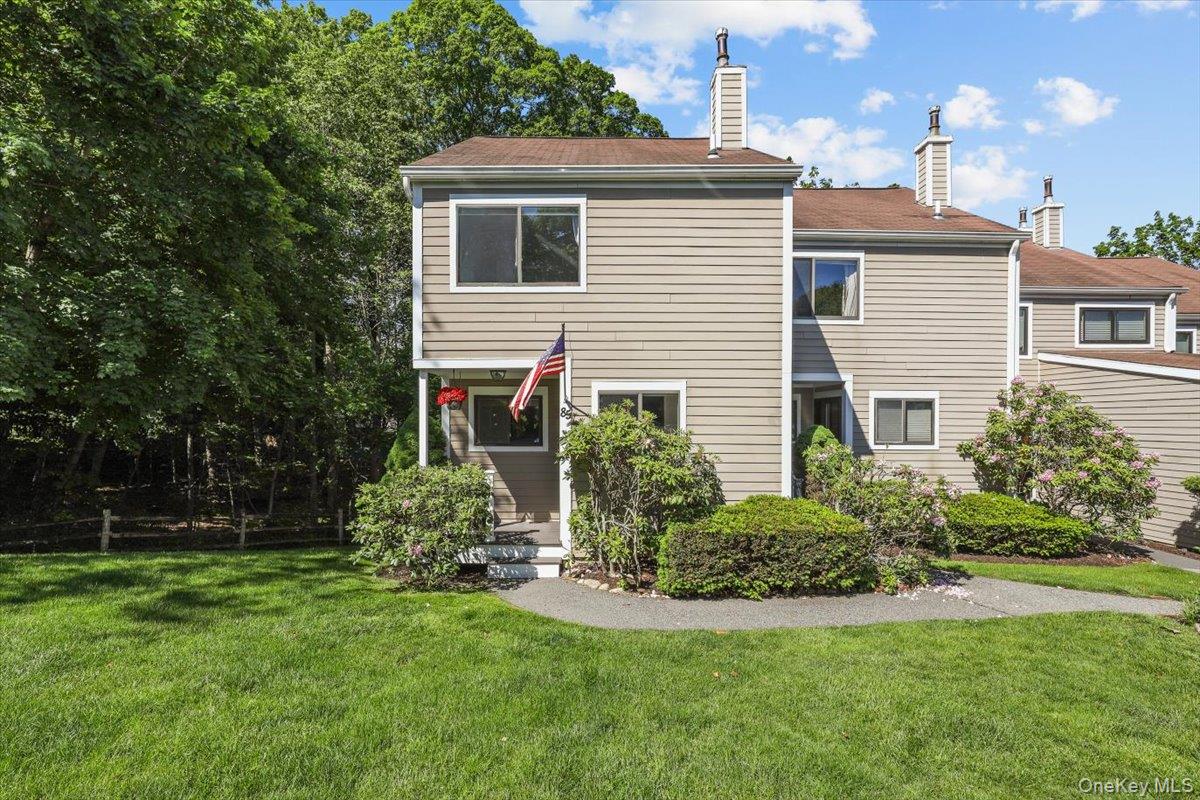 Situated in the most private section of Brookside Village, this 1,800 square foot beautifully updated tri-level end-unit townhouse offers privacy, luxury, and low property taxes. The main level features an open-concept layout with an updated kitchen, powder room, spacious living and dining areas, crown moldings, custom lighting, and a deck overlooking a peaceful brook and wooded setting. The kitchen boasts custom cabinetry, granite countertops, a tumbled marble backsplash, under-cabinet lighting, and stainless steel appliances. Upstairs are two generously sized bedrooms, each with its own updated en-suite bath, plus a large custom cedar closet. The finished lower level includes a family room, half bath, laundry area, and sliding glass doors leading to a private patio. Located less than a mile from downtown Mount Kisco, Metro-North, shopping, dining, and major highways, Brookside Village also offers a pool, tennis courts, basketball court, and dog run. A rare opportunity in a highly sought-after community!