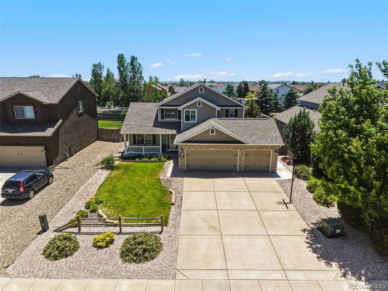 Welcome to this spacious Woodmen Hills home offering over 3,000 finished square feet, a 3-car garage, and a thoughtfully designed floor plan perfect for both everyday living and entertaining. The inviting main level features soaring ceilings, abundant natural light, multiple gathering spaces, and two fireplaces that add warmth and character throughout the home. At the heart of the home, the beautifully updated kitchen showcases granite countertops, contrasting cabinetry, a center island with seating, stainless steel appliances, and a sunny dining area overlooking the backyard. The adjacent family room creates a comfortable space to relax, while a dedicated office provides flexibility for working from home, hobbies, or study. Upstairs, the oversized primary suite is a true retreat, complete with its own fireplace, sitting area, and a spacious five-piece bath featuring dual vanities, a jetted tub, and separate shower. Two additional bedrooms and a jack & jill bath complete the upper level. The finished basement expands the living space with a large recreation room, additional flex space, and a convenient half bath. Step outside to enjoy the covered composite deck, mature landscaping, Horseshoe pit, fire pit area, and fully fenced backyard-perfect for summer gatherings, play, pets, or simply enjoying Colorado evenings. Located near parks, trails, schools, shopping, and the extensive Woodmen Hills amenities, including recreation centers, fitness facilities, pools, and open space, this home offers comfort, space, and convenience in one of the area's most popular communities.