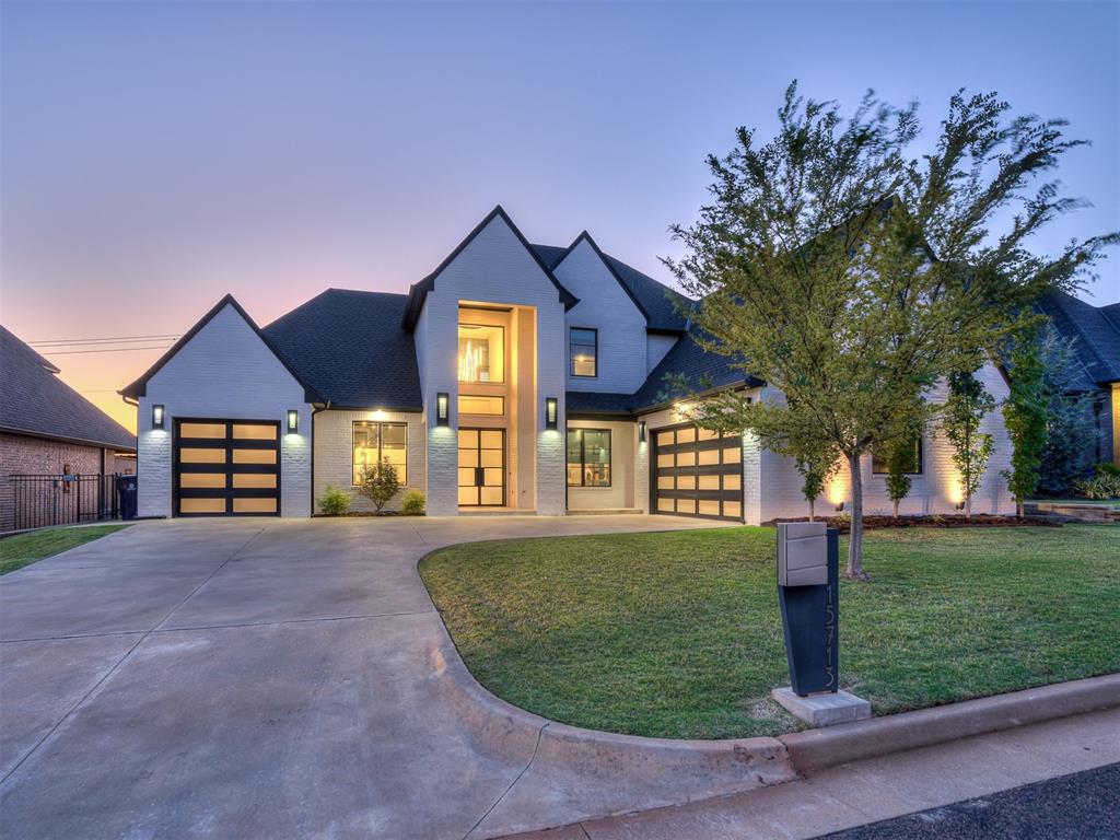 Located in the last cul-de-sac in the Esperanza North community, this custom-built home blends modern design with functionality and comfort. Double glass doors open to an inviting interior with 11'–12' ceilings and hardwood floors flowing through the living, dining, and kitchen areas. A formal dining room, private study with built-ins, and a kitchen featuring a butler’s pantry and oversized island provide both function and style. Enjoy serene greenbelt views from the primary living room, framed by large windows that fill the space with natural light. The primary suite is located downstairs with two large walk-in closets, a walk-in shower with a glass door to keep you warm, two private vanities with additional built-in storage, a beautiful free-standing tub and an abundance of space. In addition, it has direct access to the utility room. Three guest bedrooms include one downstairs and two upstairs, along with a spacious upstairs living area that opens to the covered patio. It backs into a greenbelt and a pond and offers peaceful views and beautiful sunsets.  A bonus room off the third-car garage is ideal for an exercise area, playroom, seasonal or holiday storage. Outdoor living includes a covered patio with fireplace and retractable sunscreen. Since purchasing the property, the seller has completed unfinished interior projects and invested in landscaping, while also replacing the roof within the past 6 months. Neighborhood amenities feature a large pool, rentable clubhouse, and HOA-maintained lawn care.