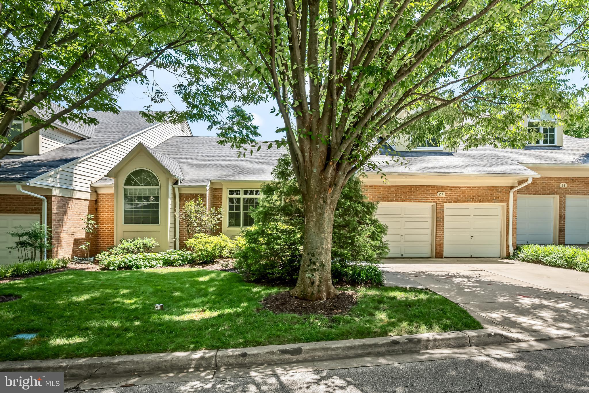 When you’re ready for effortless living — but refuse to give up space, style, gardening or your baby grand - this is the home you’ve been waiting for.Privately tucked away on a quiet cul-de-sac in Cross Keys, this sophisticated residence offers more than 4,600 square feet of beautifully designed living space with the convenience of first-floor living and the peace of mind of condo-maintained exteriors, including the roof. Built in 1998 and thoughtfully designed for flexibility, the home lives comfortably as a one-level residence while offering two additional floors, expansive guest spaces, and a two-car garage.A richly paneled library with custom shelving, desk, and storage creates the perfect work-from-home retreat or cozy reading room. The luxurious first-floor primary suite is a true sanctuary, featuring a dramatic cove ceiling, abundant closet space, separate his-and-her baths, and direct access to a private south-facing deck — the perfect setting for morning coffee or quiet evenings surrounded by greenery.Upstairs, two spacious ensuite bedrooms provide exceptional comfort and privacy for family or guests. The walk-out lower level adds even more versatility with a large family room, full bath, and workshop space ideal for hobbies, fitness, or creative pursuits.Designed for both elegant entertaining and everyday comfort, the home features gracious sun-filled living and dining spaces, hardwood floors, two fireplaces, and seamless indoor-outdoor flow. The expansive chef’s kitchen offers exceptional storage, workspace, and room to gather — a dream for anyone who loves to cook and entertain.Whether you’re seeking multi-generational living, space for frequent guests, or simply a refined home that adapts beautifully to every stage of life, this residence delivers “lock-and-leave” convenience without compromise.And beyond your door awaits the unmatched lifestyle of Cross Keys — a gated urban oasis offering pickleball, tennis, walking trails, Pilates, dining, wellness services, medical facilities, and beautifully landscaped surroundings that make everyday living feel like a retreat.