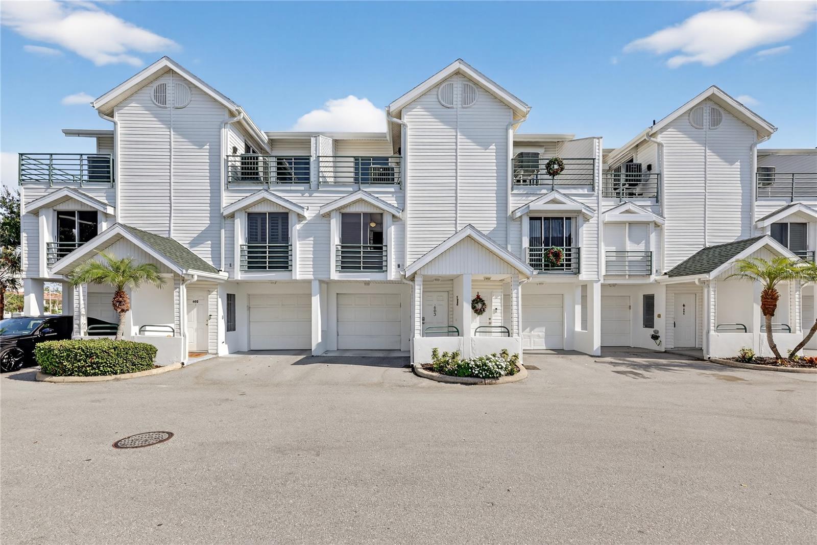 Welcome to your 24/7 vacation home!  Located in Cutter Cove and nestled in the highly coveted Island Estates community conveniently located to everything you'll need to enjoy the beach lifestyle. This beautifully remodeled 3 bedroom, 3 bathroom, 2 car tandem garage, a spiral stair case which leads to the huge loft area attached to the primary retreat, and can be used as a home office. A new roof installed in 2024. You will enjoy maintenance free living and a well managed HOA in the Cutter Cove community as well as a community pool and hot tub. And NO storm damage! Bike, walk or golf cart just about anywhere and you are 1 mile from one of if not the best beach in the country, Clearwater Beach! This townhome needs nothing! Move right in and start enjoying the beach life right away! Located at the end of Memorial Causeway in Clearwater, the Cutter Cove community offers a rare opportunity to enjoy the coastal lifestyle in the highly desirable Island Estates and Clearwater Beach area. This extremely well maintained townhome presents an exceptional blend of comfort and convenience. Just minutes from the vibrant Clearwater Beach and the charm of Downtown Clearwater, this unit is ideal for those seeking a second home, an investment property, or a permanent beachside residence. A must see!