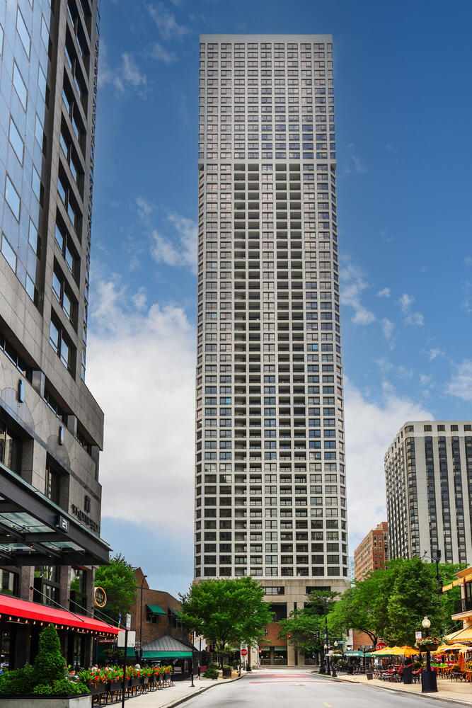 Spectacular and luxurious completely remodeled high floor S/E Corner 2BR + Den/2BA at coveted Newberry Plaza offering the ultimate in Gold Coast living and lifestyle! Overlooking Gibsons, Tavern on Rush, and Mariano Park, this one-of-a-kind residence showcases breathtaking, unobstructed, panoramic views of Lake Michigan and the downtown skyline - all just steps from Chicago's world-class shopping, dining and entertainment. This amazing sun-drenched home provides an exceptionally gracious floor plan with over 50 linear feet of open concept living space, including direct access to the fabulous 20FT wide private east-facing balcony, the perfect spot to savor your morning coffee or enjoy an evening toast with friends as the city comes to life. The home's magazine-caliber interior features Brazilian flint hardwood floors, a stylish LR wet bar with wine fridge, and a stunning kitchen with gorgeous white quartz countertops, matching full-height backsplash with under-cabinet lighting, large island with waterfall edge, sleek modern cabinetry with paneled appliances, and top-of-the-line Sub-Zero, Wolf double oven and induction cooktop, Miele exterior-vented hood, and Bosch dishwasher. The primary suite with city views offers a spacious walk-in closet and a large, sumptuous en suite bathroom with heated floors, beautiful designer tile work, oversized shower with steam, rain, hand-held sprayer and bench, private water closet, and dual vanity with extra built-in cabinetry. Extra-large in-unit laundry room with full sized washer and dryer. Includes two storage units on the same floor.  Well run professionally managed full-amenity building with 24-hour door staff, fitness center, outdoor pool, sundeck, conference room, bike room, and on-site dry cleaning. HOA's include cable TV and high-speed internet. Leased garage parking available thru SP+. Welcome home to the very best of urban residential living!