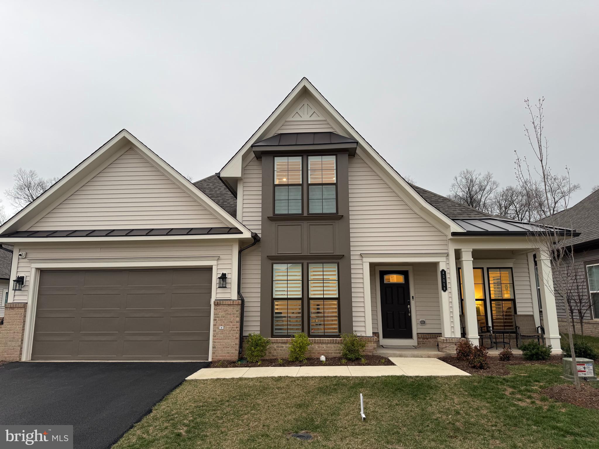 THIS HOME IS GORGEOUS!!! Welcome to this exceptional Miller & Smith Aurora model in the highly sought-after 55+ community of Birchwood at Brambleton, showcasing over $173,000 in premium upgrades and offering the perfect blend of luxury, comfort, and low-maintenance living.  This beautifully designed home features 3 spacious bedrooms, 3 full baths, and an inviting screened-in porch, with an open and airy floor plan that is ideal for both everyday living and entertaining. The gourmet kitchen is a standout, featuring quartz countertops, high-end finishes, and abundant workspace, flowing seamlessly into the dining and family rooms to create a warm and welcoming gathering space. Step outside from the screened-in porch to enjoy the fenced rear yard, perfect for relaxing or entertaining guests.  The thoughtful layout offers convenient main-level living, while additional flexible space provides privacy for guests, hobbies, or a home office. All mounted TVs convey, along with a custom alarm and security camera system, adding both value and peace of mind.Birchwood residents enjoy one of Northern Virginia’s most impressive active adult amenity centers, including indoor and outdoor pools, a fitness center, aerobics and dance studio, hobby and game rooms, arts and crafts studio, theater, demonstration kitchen, and vibrant social spaces. Outdoor amenities feature pickleball and bocce courts, golf practice facilities with putting green, scenic lakes and fishing ponds, walking and biking trails, community garden plots, gazebo, patio, and fire pit.  Ideally located just minutes from Brambleton Town Center’s shopping, dining, and everyday conveniences, this home truly offers the best of luxury, lifestyle, and location.  Seller prefers closing ASAP with option to rent back through May.