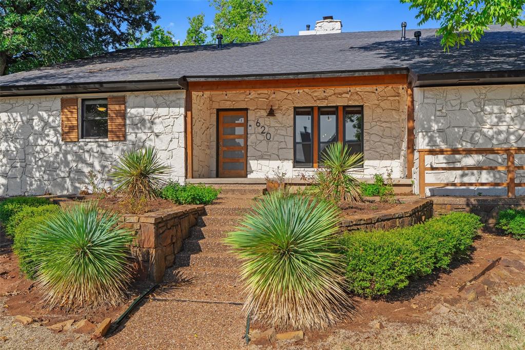 Set on a spacious corner lot beneath a canopy of mature trees, this home offers a rare combination of architectural character, generous living spaces, and an established central Edmond location. This 3-bedroom, 2-bath home features a flexible floor plan and wonderful potential to make the spaces your own. Inside, soaring cathedral ceilings create an impressive sense of volume, while a distinctive two-sided wood-burning fireplace serves as a focal point and connects the living areas. Large rooms provide plenty of flexibility for gathering, entertaining, working from home, or creating spaces tailored to your lifestyle. Outside, the stone exterior, mature landscaping, and tree-filled setting give the home a timeless presence. The expansive corner double lot offers an uncommon amount of outdoor space, complemented by an open deck and attached two-car garage. The location is equally appealing. Just steps from Fink Park, with trails leading toward Hafer Park, the home offers convenient access to some of Edmond’s favorite outdoor spaces. UCO, shopping, dining, and the amenities of central Edmond are also nearby.