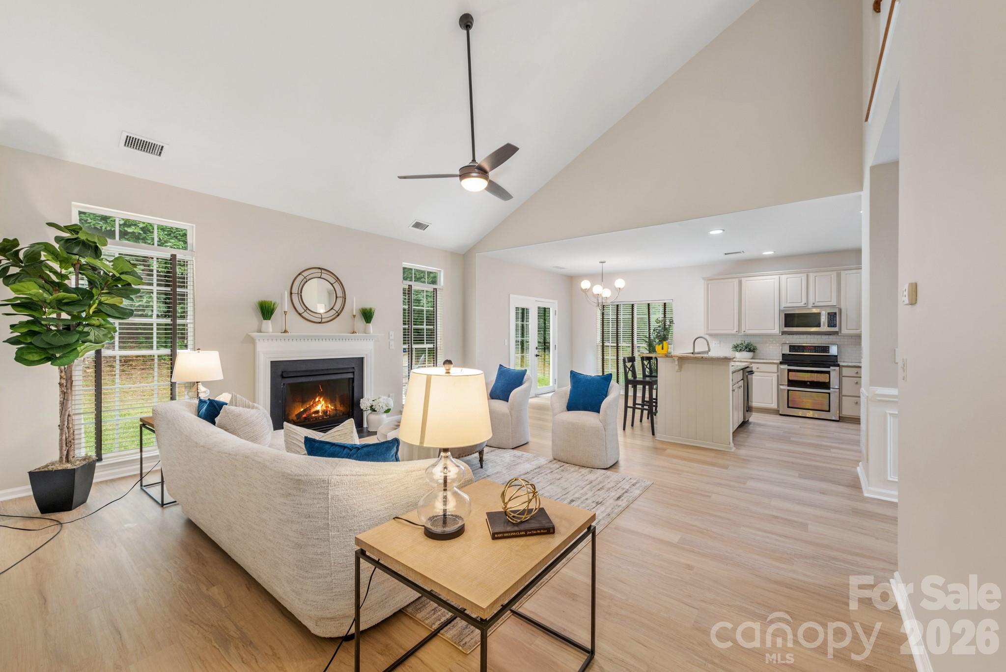Open-concept living feels beautifully reimagined in this transitional home near Lake Norman in Cornelius, North Carolina. Designed for comfort, connection, and everyday ease, this 5-bedroom, 3.5-bath residence offers 2,788 square feet across a thoughtful two-story layout.The vaulted family room creates an impressive sense of volume and natural flow, opening to the kitchen and dining areas for effortless gathering. A private office, powder room, and main-level primary suite add convenience and flexibility for modern living. Upstairs, four additional bedrooms and two full baths provide space for guests, hobbies, or work-from-home needs.Out back, a flat backyard with a firepit invites relaxed evenings, quiet conversations, and easy outdoor enjoyment. The community enhances the Lake Norman lifestyle with a pool, day dock, sidewalks, and nearby bike trails, placing recreation and connection close to home.Located in Cornelius near Lake Norman, this move-in-ready home offers the open layout, lifestyle amenities, and sought-after Charlotte-area location today’s buyers want.