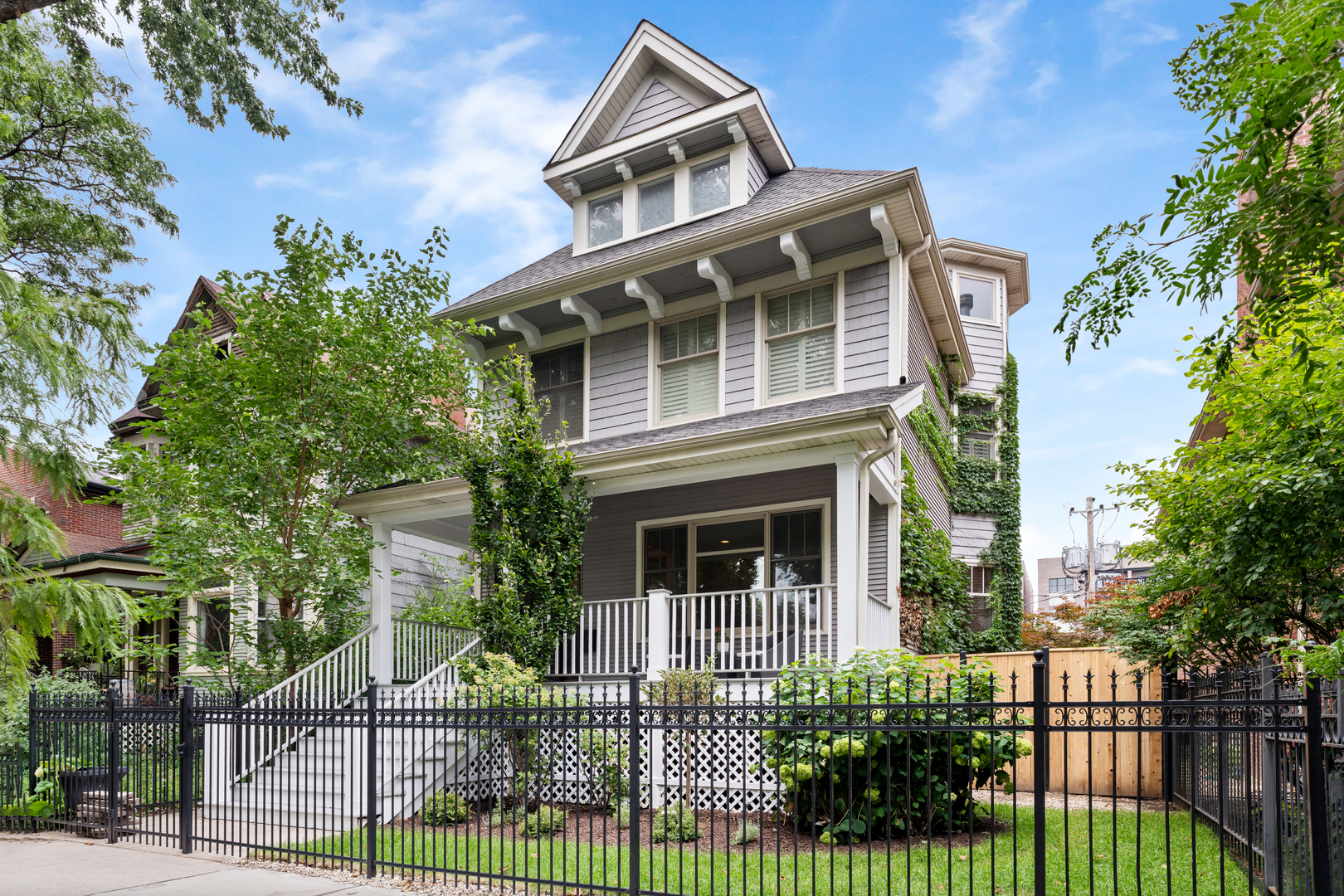 Welcome to your next urban oasis where high quality vintage meets today's luxurious upgrades! Gorgeous, spacious 5 bedroom, 4.5 bath home on a quiet street on an oversized lot (37.5 x 121), thoughtfully renovated & redesigned (2010, 2025) in Coonley School District. Highlights include - main level - a large foyer that leads to a light-filled living room anchored by a fireplace, a formal dining room with beautiful millwork, a great room that boasts an enormous, well-appointed chef's kitchen with prep island & 6 person breakfast bar, an informal dining space and a family room, a zen garden area above the back entry mudroom and a half bath with a wall of onyx; 2nd level includes a large airy primary suite with spa-quality bath & a huge walk-in closet and 3 additional bedrooms, 1 ensuite & 2 other bedrooms that share an additional full bath; lower level boasts a large family room, large additional bedroom & a separate workout room, full bath with rain shower and full laundry room; 3rd level offers a large, fully finished family room flooded with light, possibility & character along with a generous storage space. Additional features of this well-appointed home include 10 ft ceilings throughout, rift sawn walnut-stained white oak flooring, dual zone space pac systems, tankless water heater, 2 laundry rooms (2nd floor & lower level), welcoming front porch, blue stoned backyard with Japanese maples & tranquility pond. A 3 car garage completes this stunning property. Nothing to do but move into this inviting, elegant, understated home.