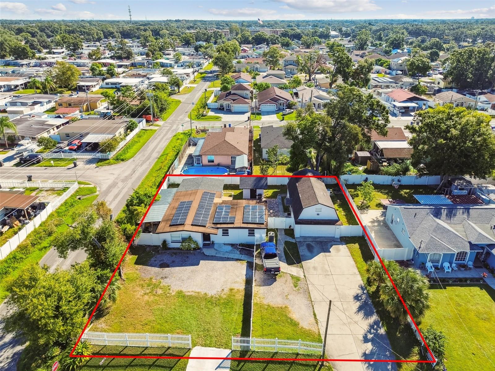 Location, Location, Location...Turnkey income property generating $7,150 a month, featuring solar panels, a double lot, and located outside flood zones. Investors and savvy buyers — this is a rare opportunity to own a fully rented, income-producing property in Tampa generating $7,150 a month across four separate units! Situated on a huge 12,810 sq ft double lot, this property is zoned RSC-9, allowing for up to 9 dwelling units for gross acre (buyer to verify).Unit Breakdown & Rents:• Main Home: 3 Bed / 2 Bath – Rented at $2,600/month• Attached In-Law Suite (Unit B): 1 Bed / 1 Bath – Rented at $1,500/month (private entrance)• Detached Apartment 1: 1 Bed / 1.5 Baths – Rented at $1,500/month• Detached Apartment 2: 1 Bed / 1.5 Baths – Rented at $1,550/monthTotal Monthly Income: $7,150The main home is equipped with solar panels (included in the sale), helping to offset utility costs. The property is not located in a flood zone and has never experienced flooding, offering peace of mind and lower insurance costs.Highlights:• Four income-producing units on one property• Zoned RSC-9 – development potential• Large 12,810 sq ft lot (double lot)• Solar panels included• Separate entrances for all units• Ideal for investors or multi-generational livingPrime Central Tampa Location:• 6 mins to George M. Steinbrenner Field• 7 mins to Al Lopez Park• 8 mins to Raymond James Stadium• 17 mins to Armature Works• 20 mins to Ybor City & Courtney Campbell Causeway Beach• 22 mins to Channel side District & Sparkman WharfThis is your chance to own a high-performing rental property with solid income and long-termupside. Showings by appointment only — schedule today!