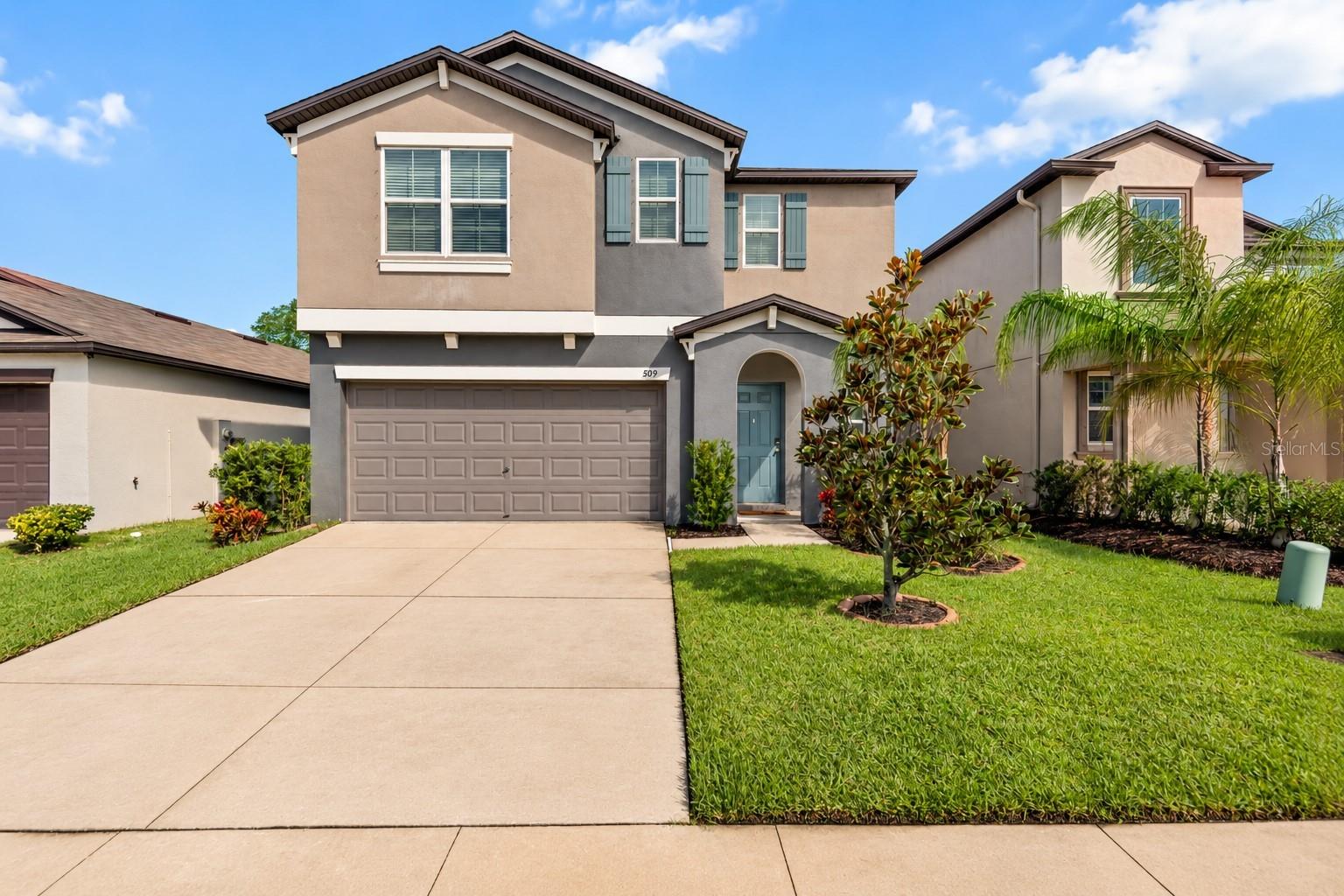 Exterior listing photograph: Six-Bedroom Home with a Screened Lanai in Ruskin