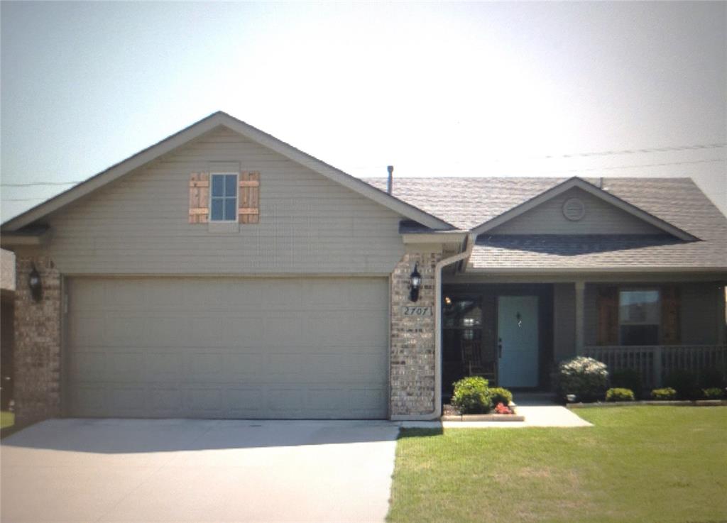 This adorable 3-bedroom, 2 bath home has a wonderfully inviting open floor plan.  The spacious living room offers high ceilings, ceiling fan, and a door to access the back yard.  The kitchen has ample cabinets, quartz countertops, a smooth top range and pantry.  The laundry is conveniently located off of the kitchen. The home has a split floor plan, with and ensuite bath and walk in closet in the main bedroom.  The home is nestled in a neighborhood that is close to schools, shopping, entertainment and more.  You simply must come view it today.  Welcome Home!