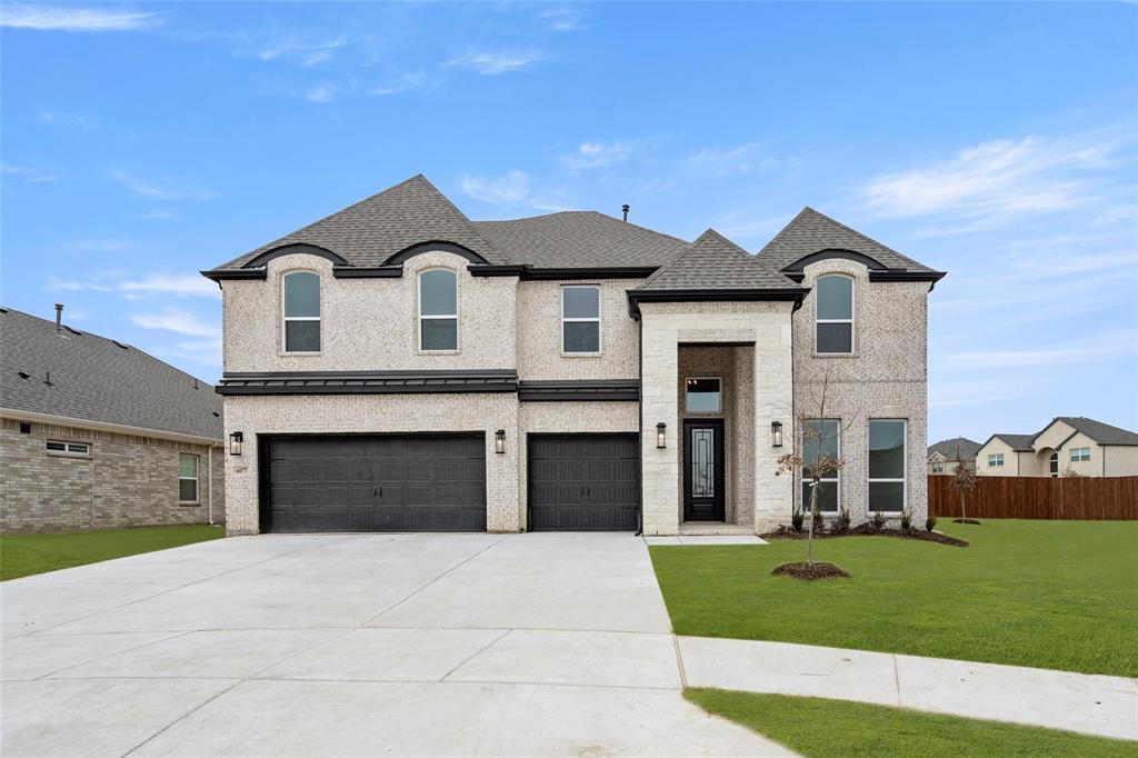 MLS# 20777247 - Built by First Texas Homes - Ready Now! ~ Nestled on an oversized, pie-shaped lot with a backyard spanning over 116 feet in width, this home offers an exceptional outdoor retreat. The expansive covered patio is perfect for family gatherings and entertaining. The striking curb appeal features high roof pitches, a metal roof awning over the garages, a stone arch entry, and a herringbone detail in light brick tones. Inside, enjoy soaring ceilings, an open-concept layout, and abundant natural light that fills the space beautifully. The kitchen boasts an open island workspace, double ovens, a 5-burner cooktop, and a spacious walk-in pantry, ideal for culinary enthusiasts. For indoor entertainment, a home theater and game room await. This new build is enhanced with numerous upgrades, combining luxury and functionality throughout.
