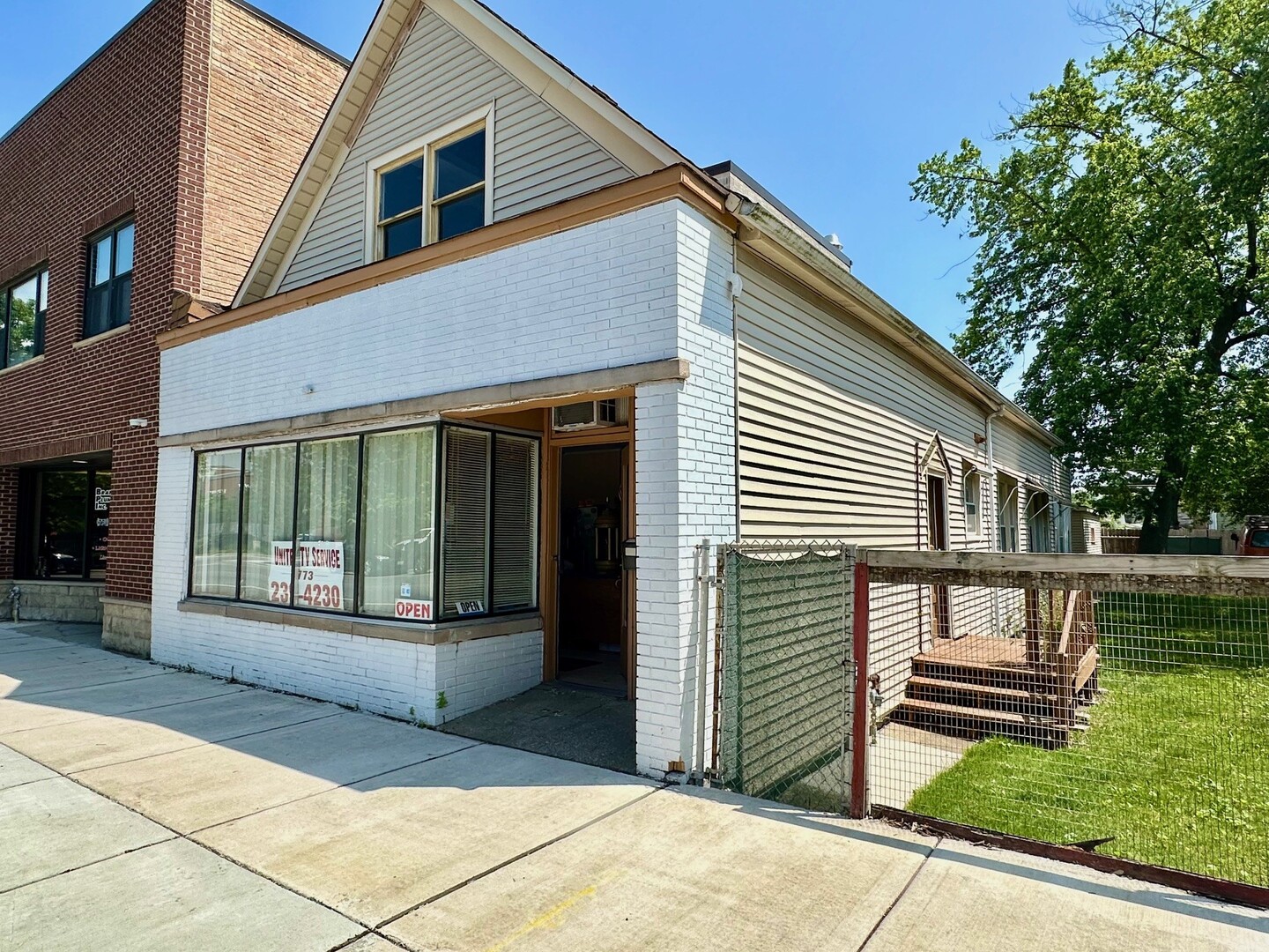 Incredible Investment Opportunity in Prime Mount Greenwood! Here's your chance to own a well-maintained mixed-use two-flat in one of the most desirable high-traffic corridors on 111th Street in Mount Greenwood. This property offers excellent visibility, stable income, and significant upside potential. The building includes a 400 sq ft commercial space in the front and a spacious 3-bedroom, 1-bath residential unit in the rear-plus a full unfinished attic that offers future expansion potential. There's also a 2-car garage in the rear. The property has been well cared for, and both units are currently occupied with long-time, month-to-month tenants. Rents have not been raised in many years, offering immediate value-add opportunity by adjusting to market rate. The adjacent vacant 25 x 125 lot is also available for just $100,000 additional. Use it for expanded parking, outdoor space, or future development-the possibilities are endless. Both parcels have separate PINs and can be sold together. Whether you're looking to increase cash flow, expand your portfolio, or secure a prime piece of real estate in a sought-after business district, this is a must-see opportunity.