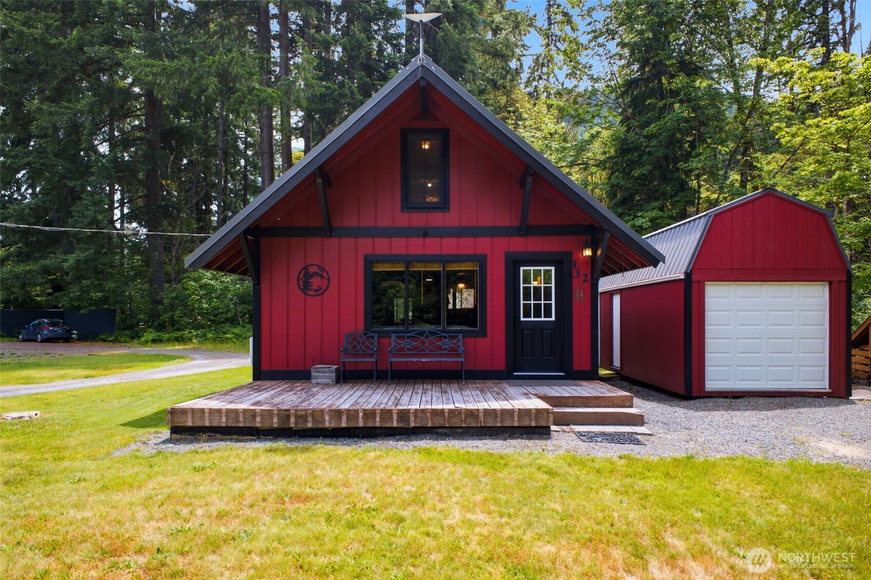 Enjoy the beauty of the Pacific Northwest from this inviting cabin near the Cispus River and Tower Rock. Ideal as a weekend retreat, vacation property, or full-time residence, this home backs directly to the Gifford Pinchot National Forest with a nearby trail leading to the river, offering exceptional access to nature and year-round recreation. Inside, warm cedar-lined walls and a wood-burning stove create a cozy cabin atmosphere, while a full kitchen, laundry area, laminate flooring on the main level, and a ductless heat pump provide everyday comfort. Recent improvements include a newer metal roof and newer pump house for added peace of mind. The 10' x 20' garage/shop with an automatic garage door offers plenty of space for ATVs, snowmobiles, fishing gear, kayaks, or workshop storage. Fully furnished and conveniently located near hiking, fishing, hunting, dirt biking, snowmobiling, skiing, and endless forest trails, this property is ready to enjoy in every season.