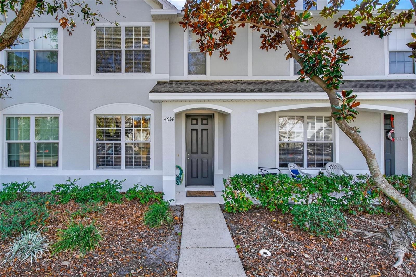 Welcome to Sawgrass Village and this beautifully updated 2-bedroom, 2.5-bath townhome that blends comfort, style, and functionality.From the moment you step inside, you’ll notice the thoughtful design touches that make this home stand out — including stylish accent walls, upgraded laminate flooring throughout, and a bright open-concept layout that feels both spacious and inviting.The kitchen is the heart of the home, featuring stainless steel appliances, pantry storage, and a decorative brick feature wall with a charming coffee bar that adds both personality and practicality. It flows seamlessly into the dining and living areas, making it perfect for everyday living or entertaining.Upstairs, both bedrooms offer the privacy of full en-suite bathrooms and generous walk-in closets — an ideal setup for roommates, guests, or a flexible work-from-home arrangement. The conveniently located upstairs laundry room adds to the home’s smart layout. A half bath downstairs ensures guests have their own space.Step outside to a private back patio surrounded by mature landscaping — the perfect spot to unwind in the evenings.Sawgrass Village is a well-maintained community featuring a large resort-style pool with updated furnishings and a dedicated dog park. Centrally located in Pinellas Park with easy access to beaches, shopping, dining, and major roadways. Whether you’re looking for your first home, a low-maintenance lifestyle, or a strong investment opportunity — this one checks the boxes.