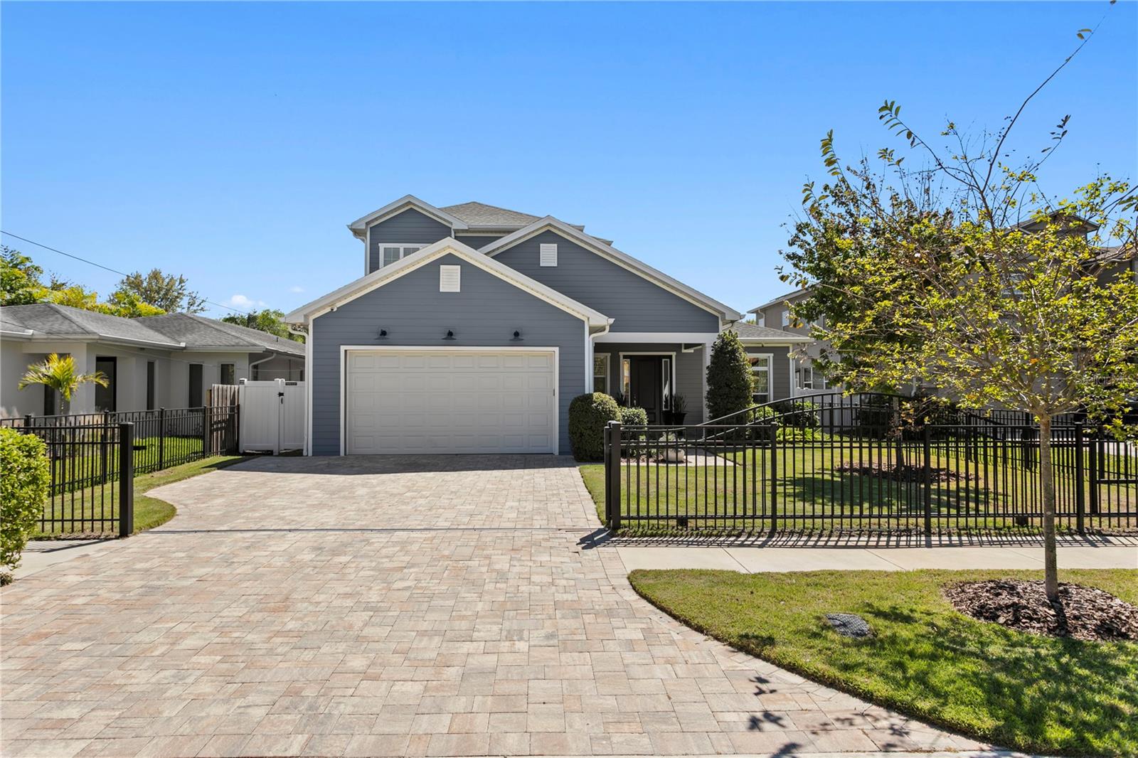 Move-in ready and beautifully designed, this custom-built home sits on an oversized 60'x 165' lot in the coveted Ballast Point neighborhood, offering quick access to Tampa’siconic Bayshore Boulevard, top-tier dining, and shopping. The open-concept kitchen,dining, and great room are filled with natural light and flow seamlessly through Frenchdoors to an expanded covered lanai overlooking a generous backyard with ample roomfor a pool, with renderings and quotes available upon request. The chef’s kitchenfeatures an oversized island with abundant storage, bar seating, wine refrigeration, anda charming window over the sink. The spacious first-floor primary suite includes twoclosets, French doors to the lanai, and a serene bath with dual sinks and an oversizedwalk-in shower. A dedicated office (or playroom), a well-planned laundry room, andexceptional storage complete the downstairs. Upstairs there are three additionalbedrooms and a full bath, with the fourth bedroom large enough to serve as a bonusroom or second office. Throughout the home, luxury wood-look vinyl flooring, highceilings, solid-core doors, detailed moldings, and abundant storage create a polishedand durable finish. The oversized three-car garage includes an air-conditioned workoutroom that can easily convert back to storage. A fully fenced yard, remote-controlledgate, and paver driveway provide privacy and peace of mind, and sellers willing to sellfurnished for a true turnkey experience. A rare opportunity in one of South Tampa’smost desirable neighborhoods in flood zone X (no flood insurance required)—schedule your private showing today.