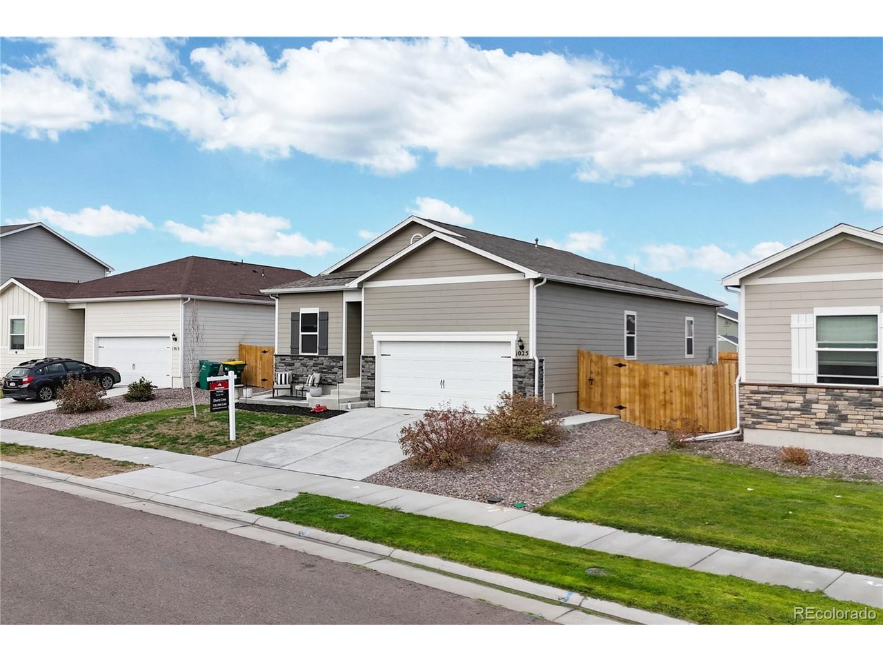 Welcome home to the Cottonwood Greens! This immaculate ranch style home (Arapahoe Model) is priced aggressively lower than inventory homes by the builder! Better than new for 3 reasons. 1. Gorgeous LVP flooring is extended throughout the home. 2. A specious concrete patio in the west-facing backyard creating an outdoor living space for BBQ's and entertaining. Although the backyard is missing green grass, it is spacious! It would be perfect for a trampoline or playground structure. Or above-ground pool would be a great idea for the hot summer days. Also a front concrete patio is added. 3. Privacy tint is applied to the windows while abundance of natural light is filling the home. Formal dining room in the front of the house could be used as a living room or office. Kitchen opens to both the dining room and the family room. Kitchen features white cabinetry, granite countertops, stainless steel appliances and sink, built-in microwave, gas cooktop and oven, refrigerator, and a pantry for additional storage. Primary bedroom features an en-suite full bathroom and a walk-in closet.