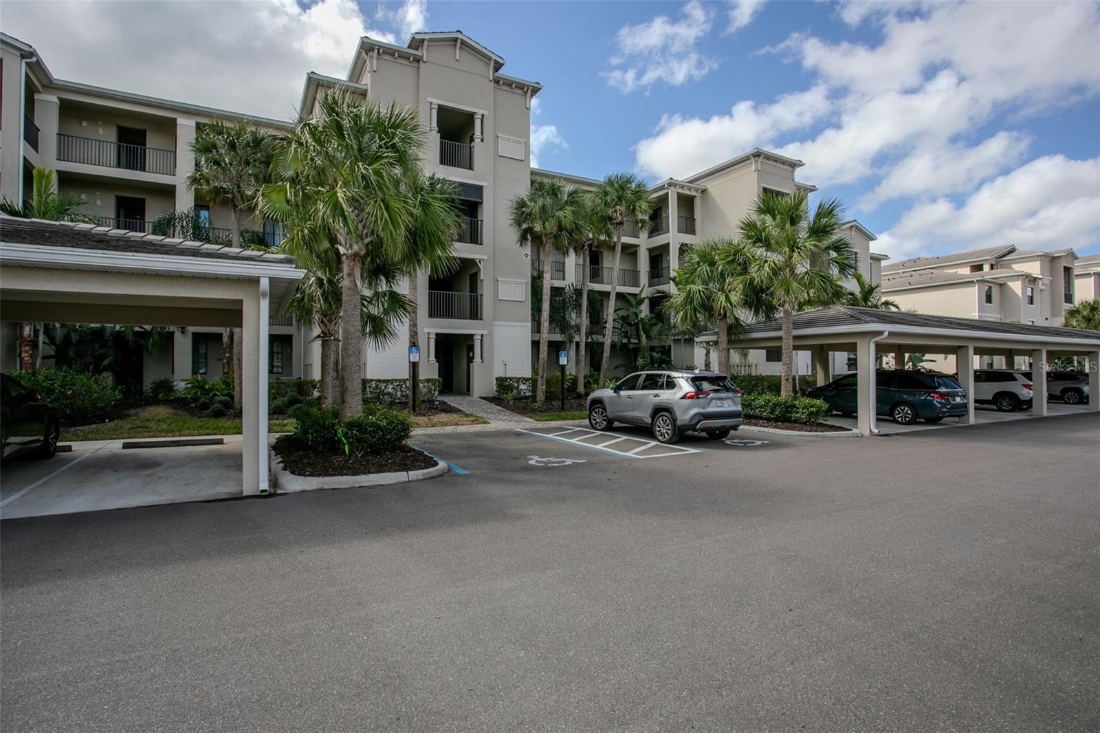 Motivated Seller. This one looks like a model home with stunning lake and golf course views plus upgrades throughout, designer paint colors, granite countertops in the kitchen and bathrooms, 42" tall kitchen wall cabinets, white shaker style kitchen cabinets, a large kitchen island and sink, crown molding throughout, 9-foot ceilings, and large format ceramic tile. Your screened balcony is your front row seat to sunrises, sunsets, a lake, and the 14th hole of the Piper golf course. Enjoy resort living in this country club setting. Full golf membership is included along with tennis, pickleball, a large resort-style main pool, plus multiple satellite pools throughout the community. a well-equipped gym, tiki bar, and full-service restaurant. The kitchen features newer stainless-steel appliances. You have an assigned covered parking spot. A building elevator brings you almost to your door. There is an extra-large storage closet between your unit and the elevator. Bring your bikes and beach gear. Lakewood National is conveniently located 30 minutes from UTC Mall, the largest retail, dining, and entertainment complex in all of Sarasota-Bradenton. Property is offered fully furnished and turnkey, with the exception of personal items, family photos, and any items specifically excluded by the seller. This property also presents an excellent investment opportunity, with strong rental income potential and a proven history of repeat renters. Ideal for investors seeking consistent returns.