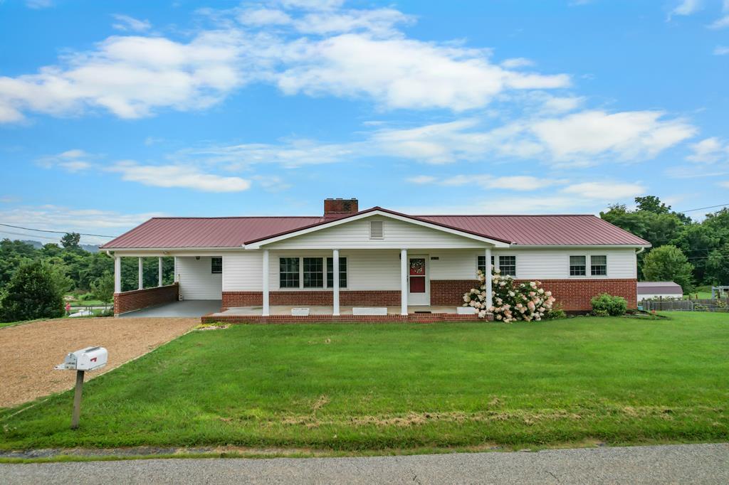 Welcome home to this spacious and versatile 3-bedroom, 3-bath property offering comfort, flexibility, and convenience. Enter from the classic front porch into the spacious and bright living room, waiting for your choice pieces.  Classic -inch floor leads you forward through the home, while the fireplace adds the finishing touch and helps break the chill on those cool winter days. The galley-style kitchen is designed for convenience and is open to the spacious great room, allowing the chef to be part of the gathering. Another stunning fireplace sets the mood and creates a warm, inviting atmosphere.  Moving down the hall from the great room, you'll find three choice bedrooms, including the primary ensuite, along with a full bath conveniently accessed from the hall for the remaining bedrooms and guests. Now make your way to the lower level, where you'll find a clean slate readyto-finish with endless possibilities. It could easily be converted into additional living space, a separate living area, a mother-in-law suite, or a teenager's dream space. This level also includes a full bath and laundry area. Now lets Head outside to enjoy the beautiful fenced backyard, perfect for your four-legged companions, along with an above-ground pool that, with a little love, could be like new. Numerous updates have been made throughout, including windows, HVAC, and baths. This house checks all the boxes. Conveniently located to I-81, Bristol, Damascus, the Virginia Creeper Trail, the Salt Trail, Hard Rock Casino, South Holston Lake, shopping, medical facilities, and more, while still offering the comfort of home. Don't miss your chance to own this wonderful home!